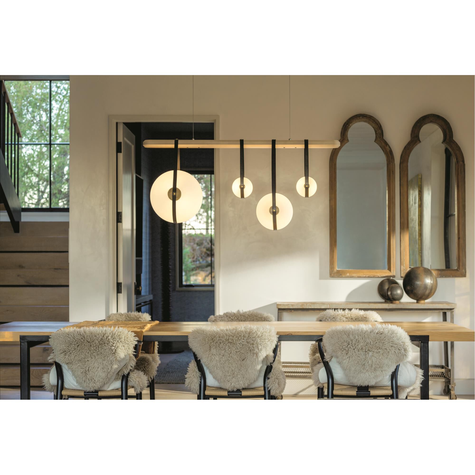 Shown in Black finish and Opal glass and Antique Brass accent