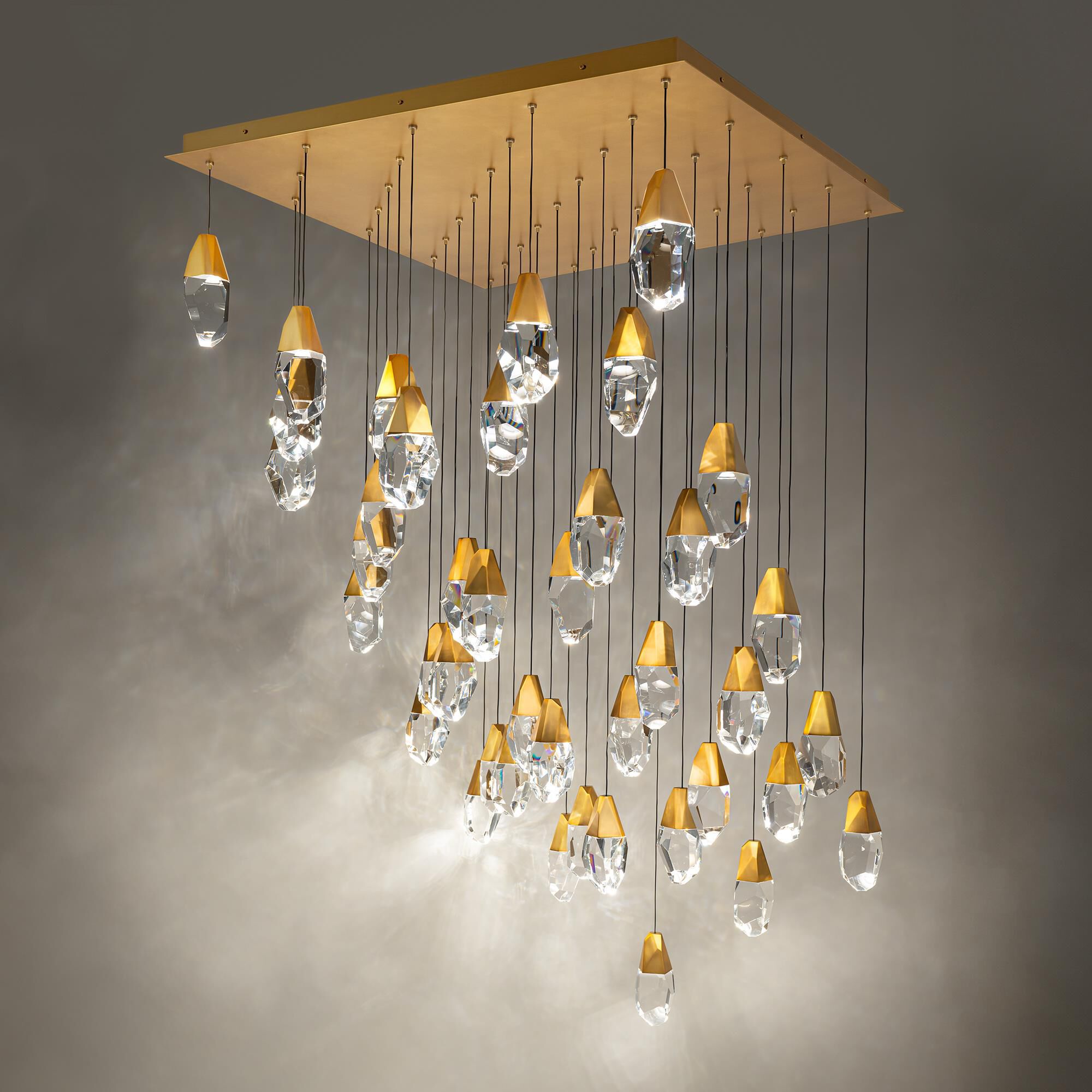 Shown in Aged Brass finish and Optic Crystal crystal