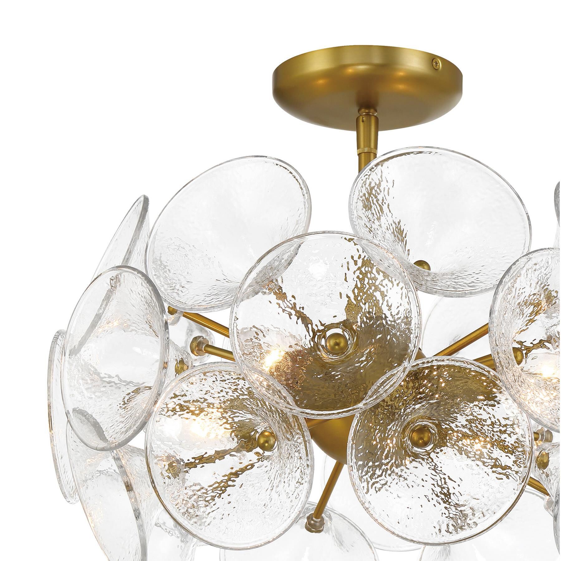 Shown in Soft Brass finish and Textured Clear Fluted glass