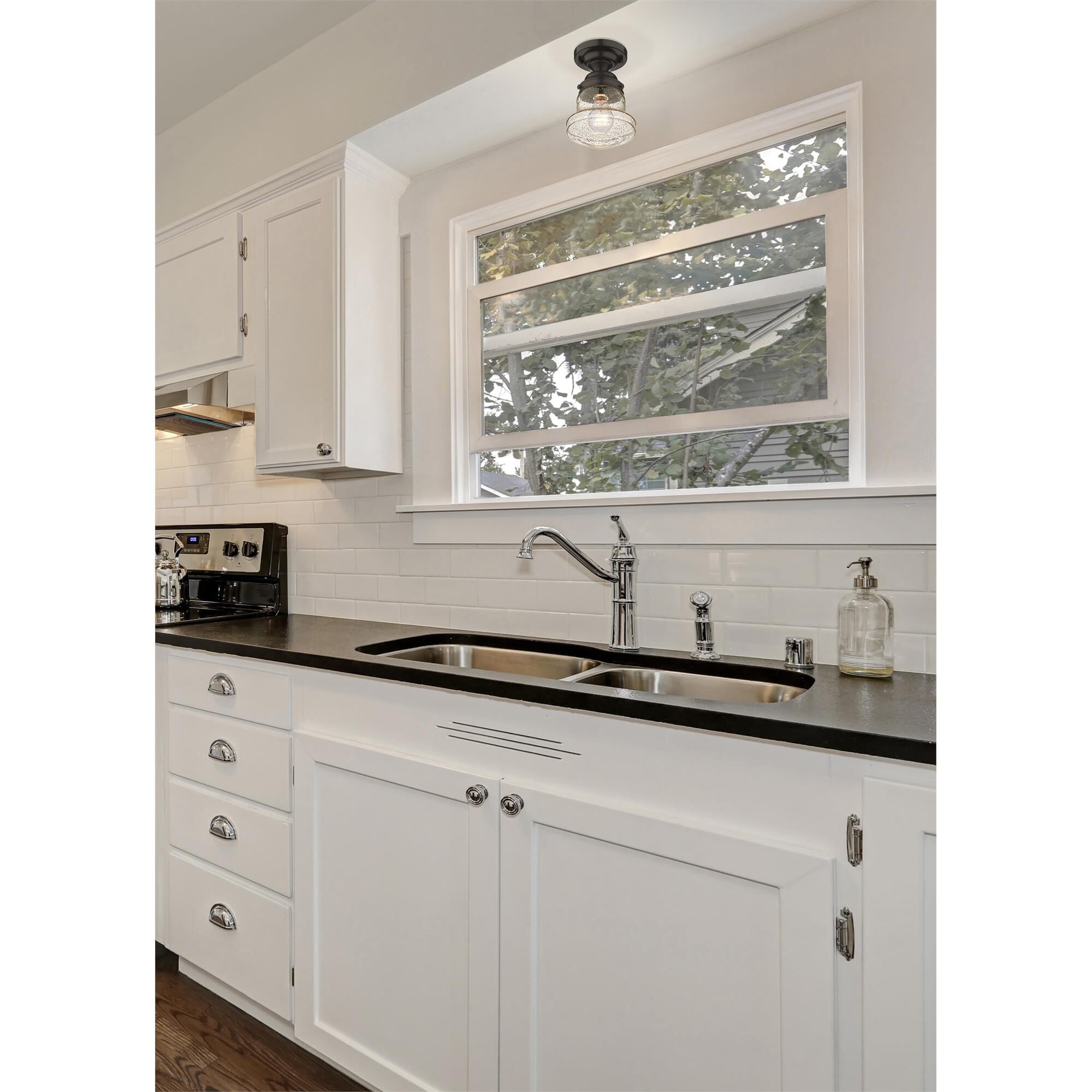Shown in Matte Black finish and Clear Seedy glass and Clear Seedy shade
