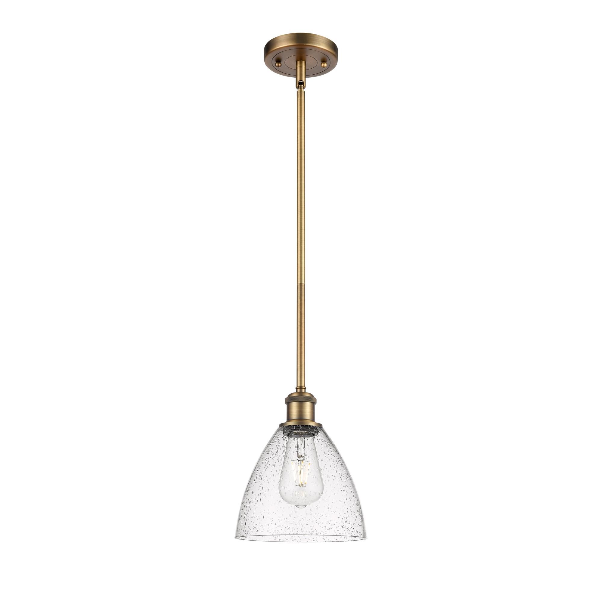 Shown in Brushed Brass finish and Seedy glass