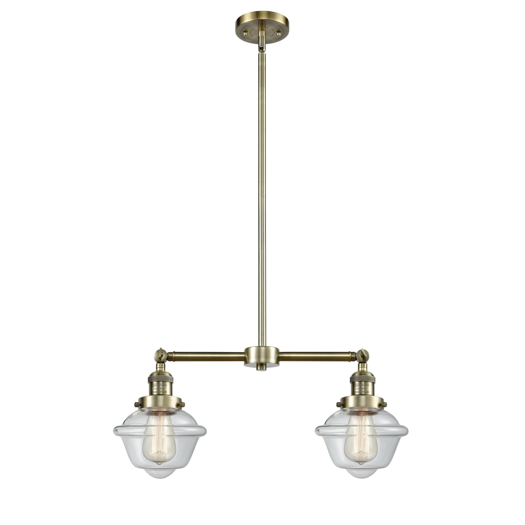 Shown in Antique Brass finish and Clear glass