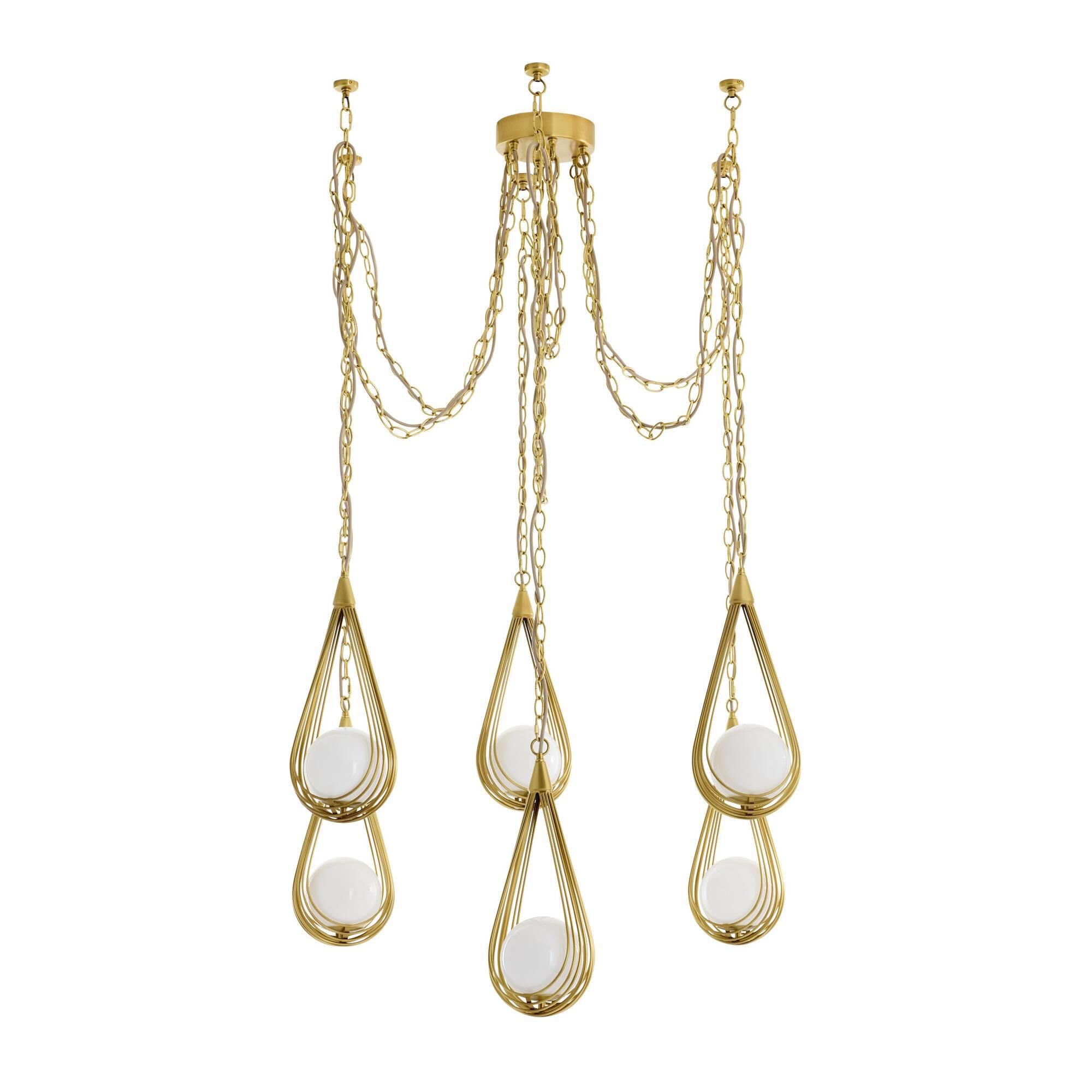 Shown in Antique Brass finish and Opal glass