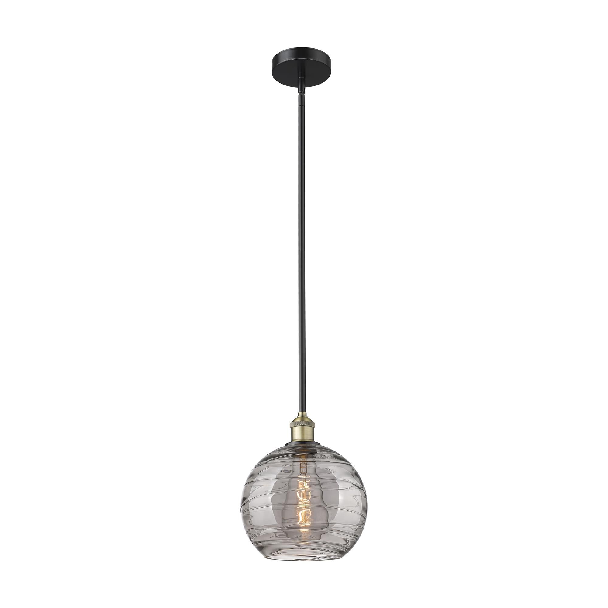 Shown in Black Antique Brass finish and Light Smoke Deco Swirl glass
