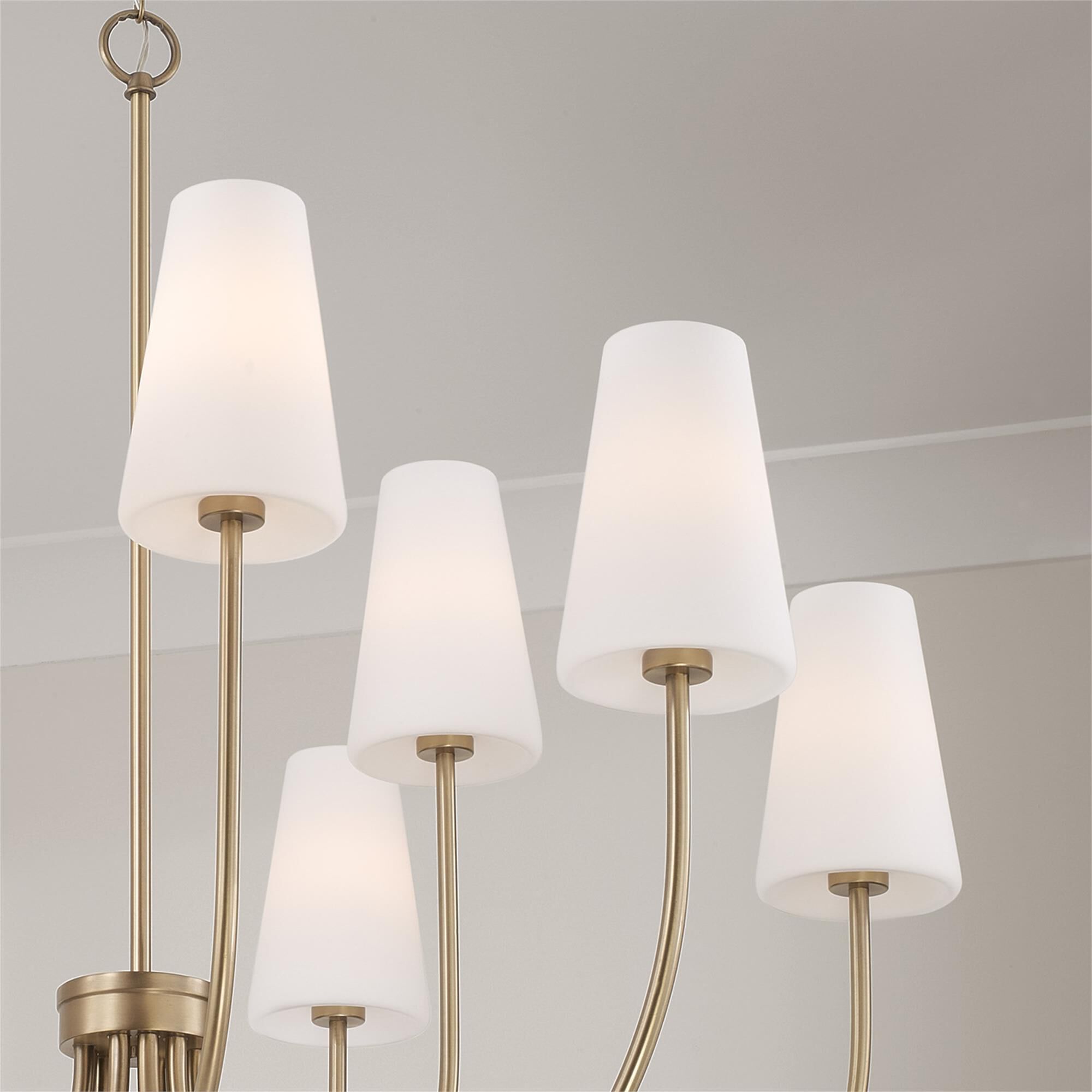 Shown in Aged Brass finish and Soft White glass