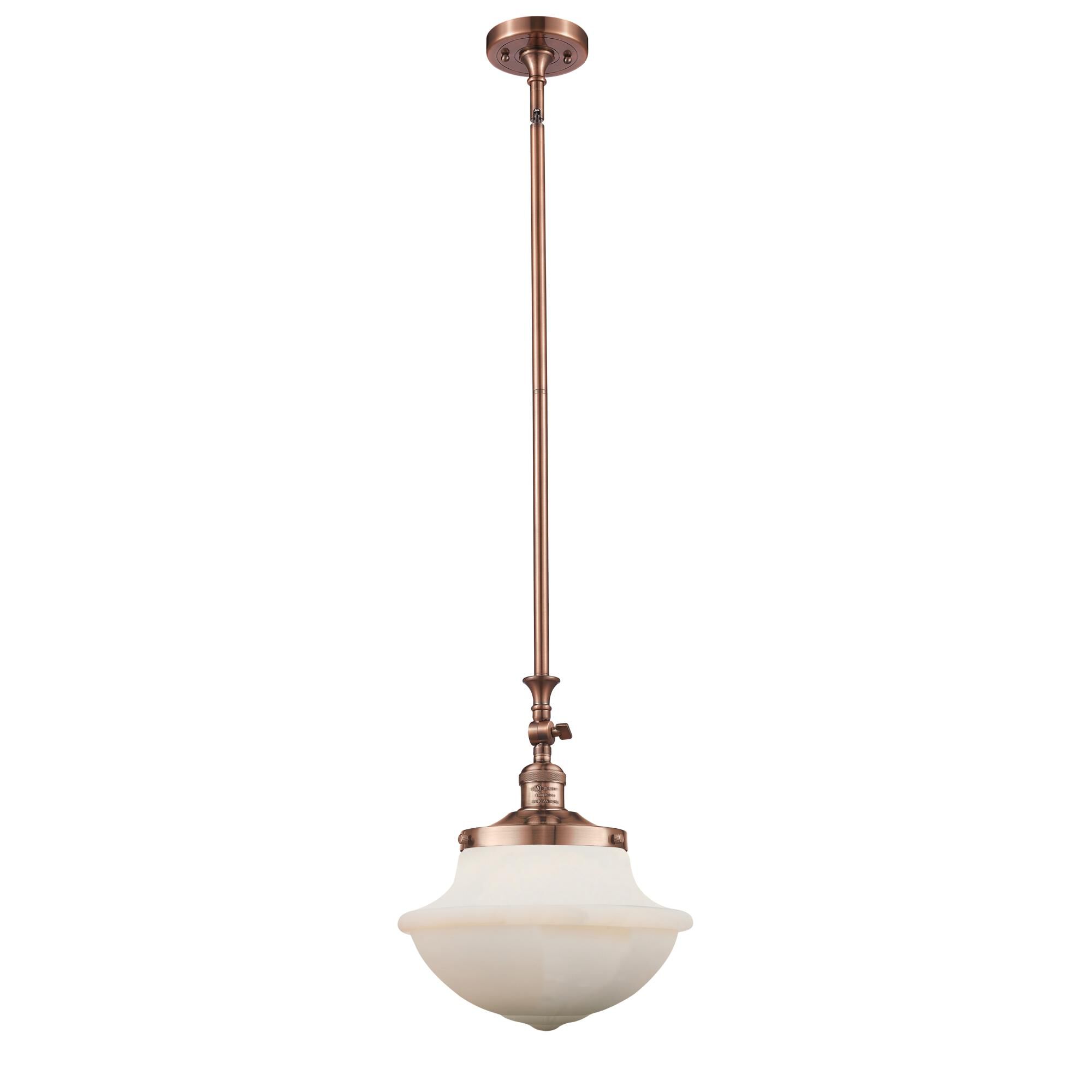 Shown in Antique Copper finish and Matte White glass