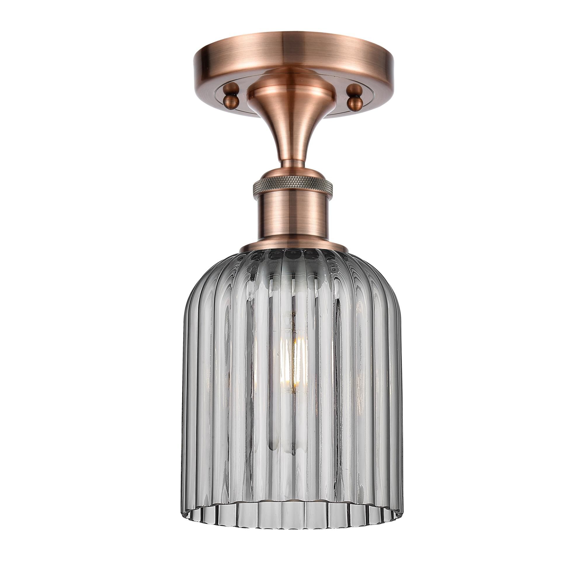 Shown in Antique Copper finish and Light Smoke shade