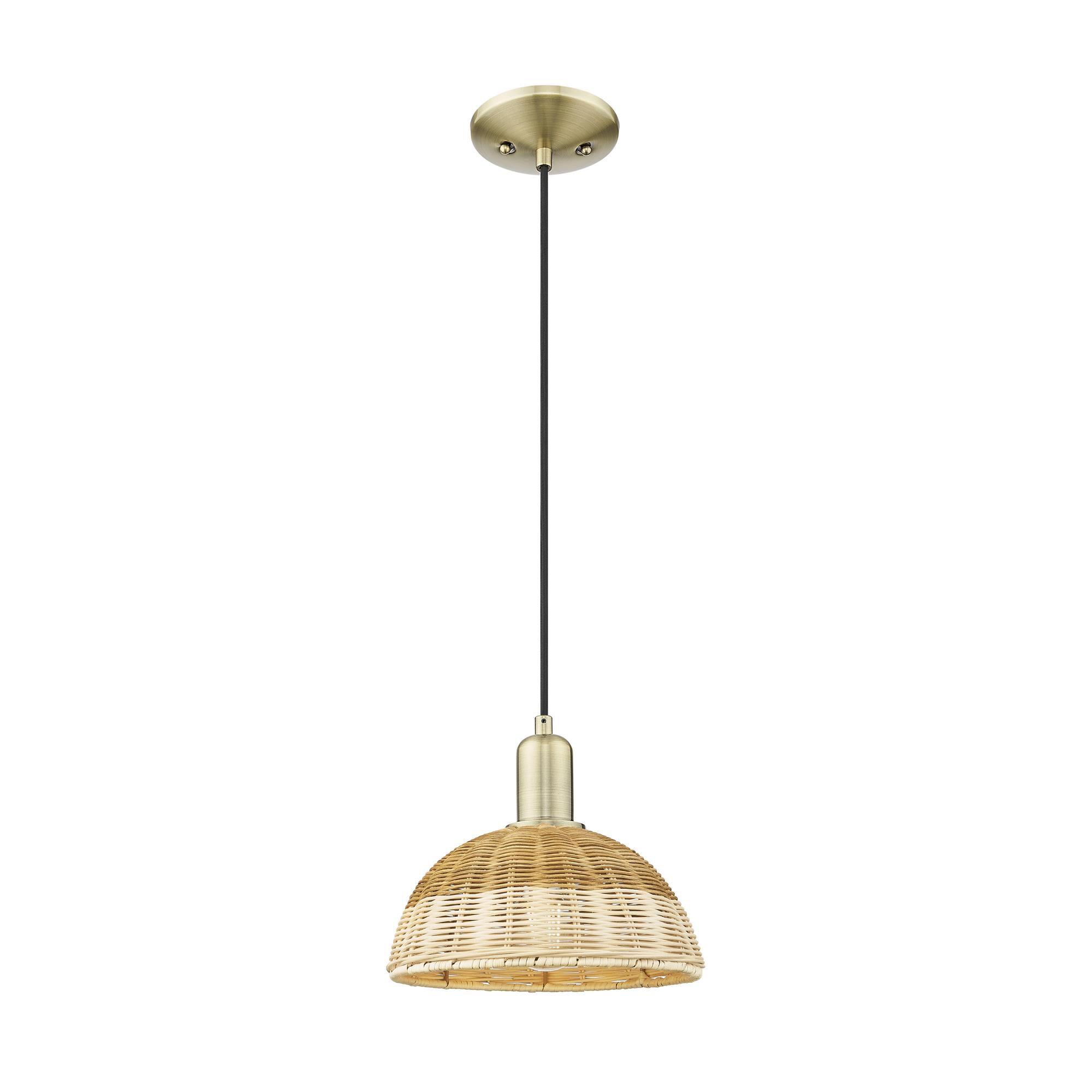 Shown in Antique Brass finish and Natural Fiber shade