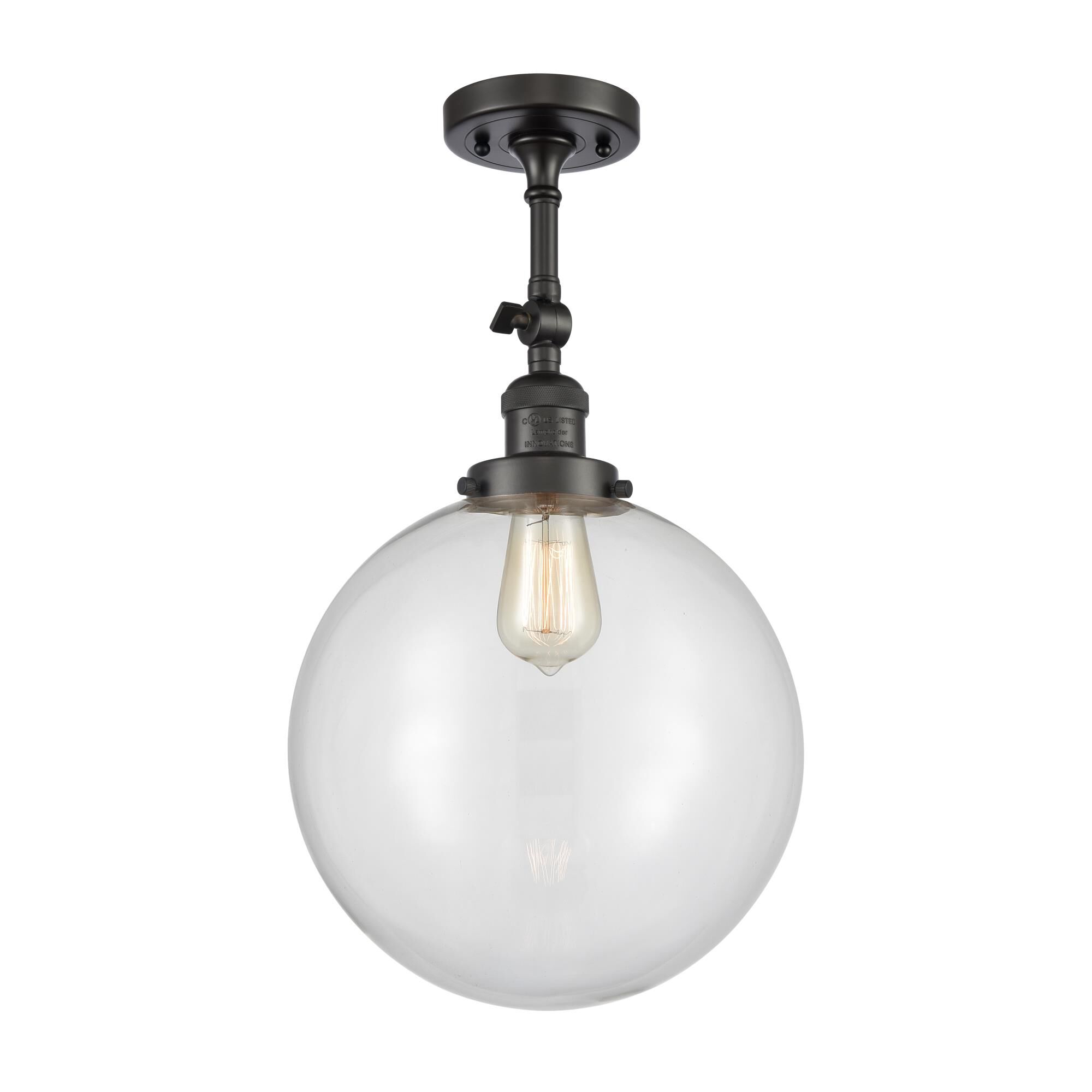 Shown in Oil Rubbed Bronze finish and Clear Beacon glass