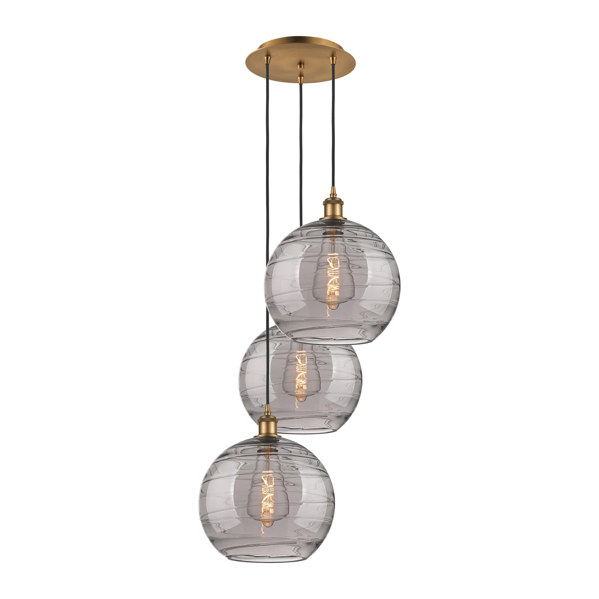 Shown in Brushed Brass finish and Light Smoke Deco Swirl glass