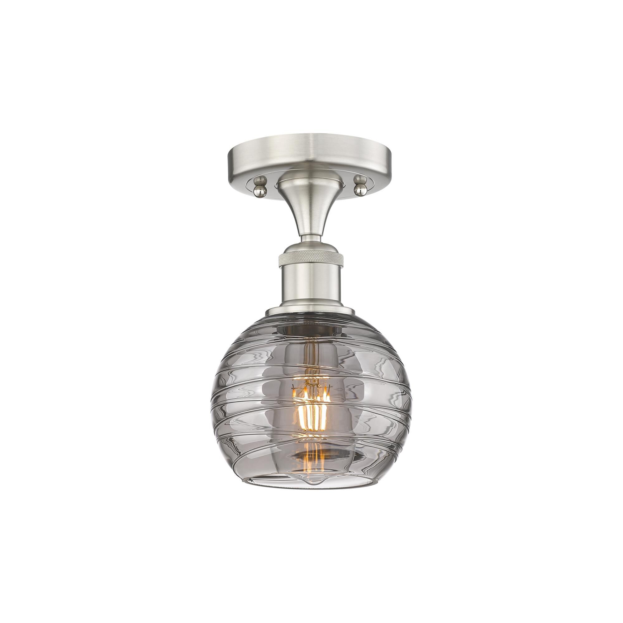 Shown in Brushed Satin Nickel finish and Light Smoke Deco Swirl glass