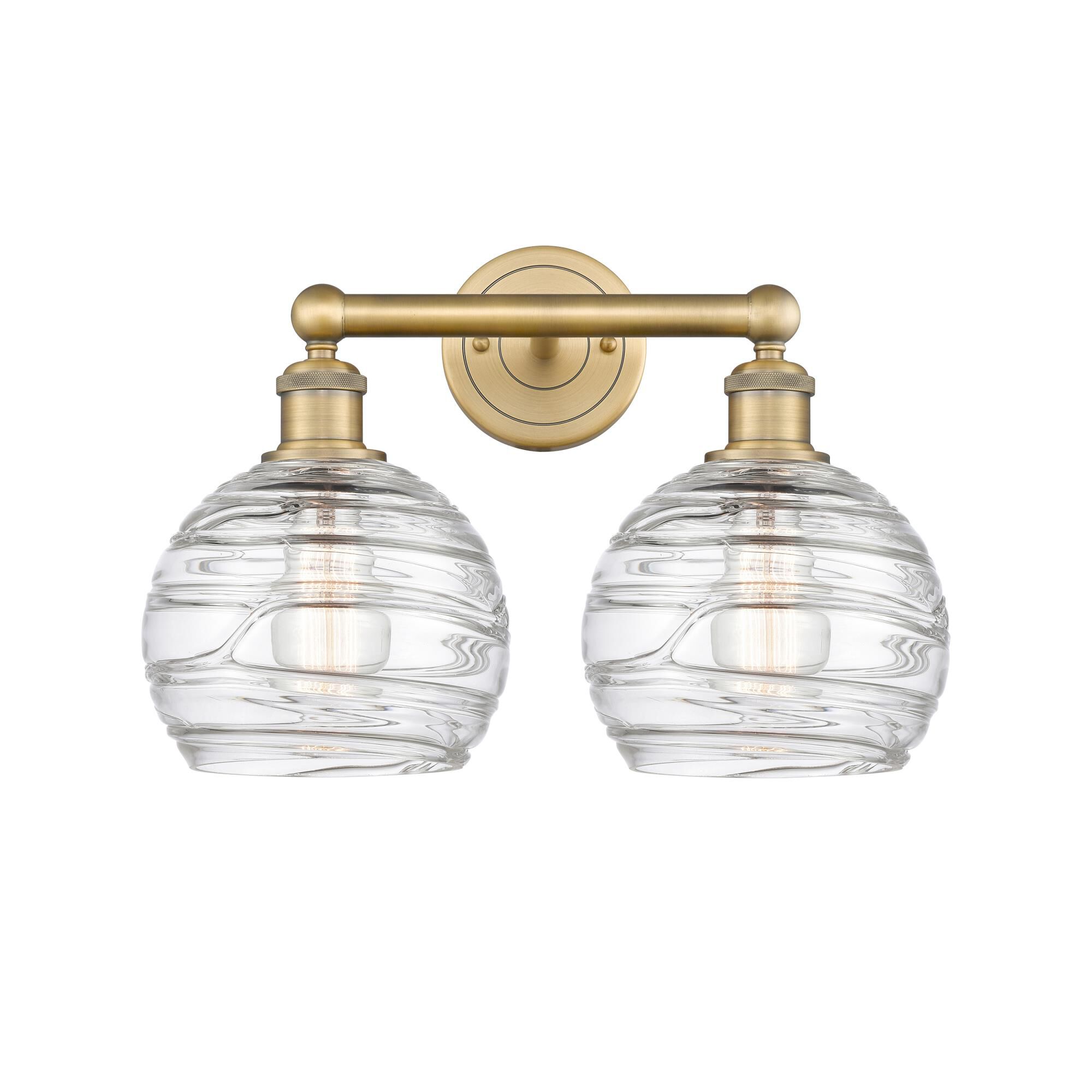 Shown in Brushed Brass finish and Clear Deco Swirl glass