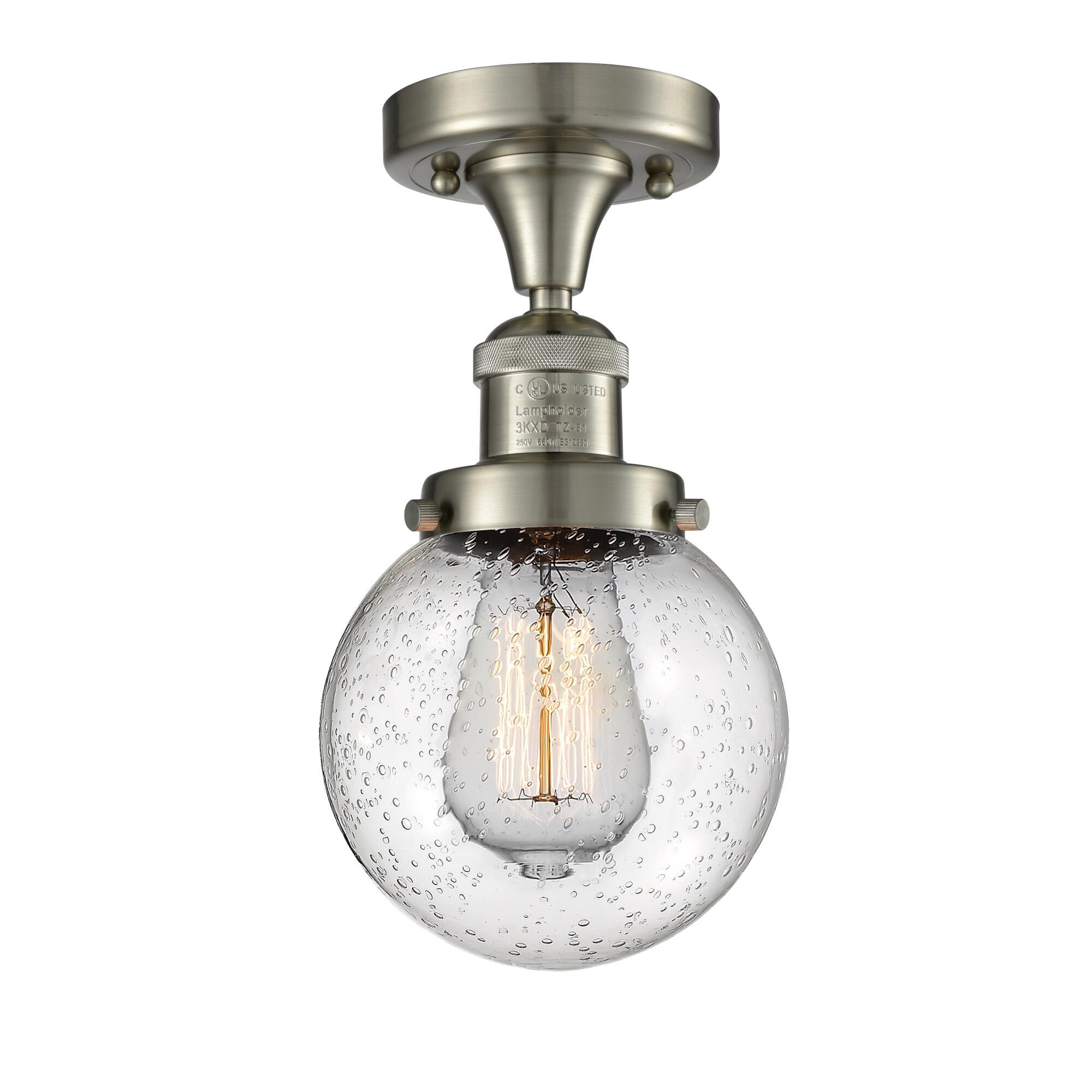 Shown in Brushed Satin Nickel finish and Seedy glass