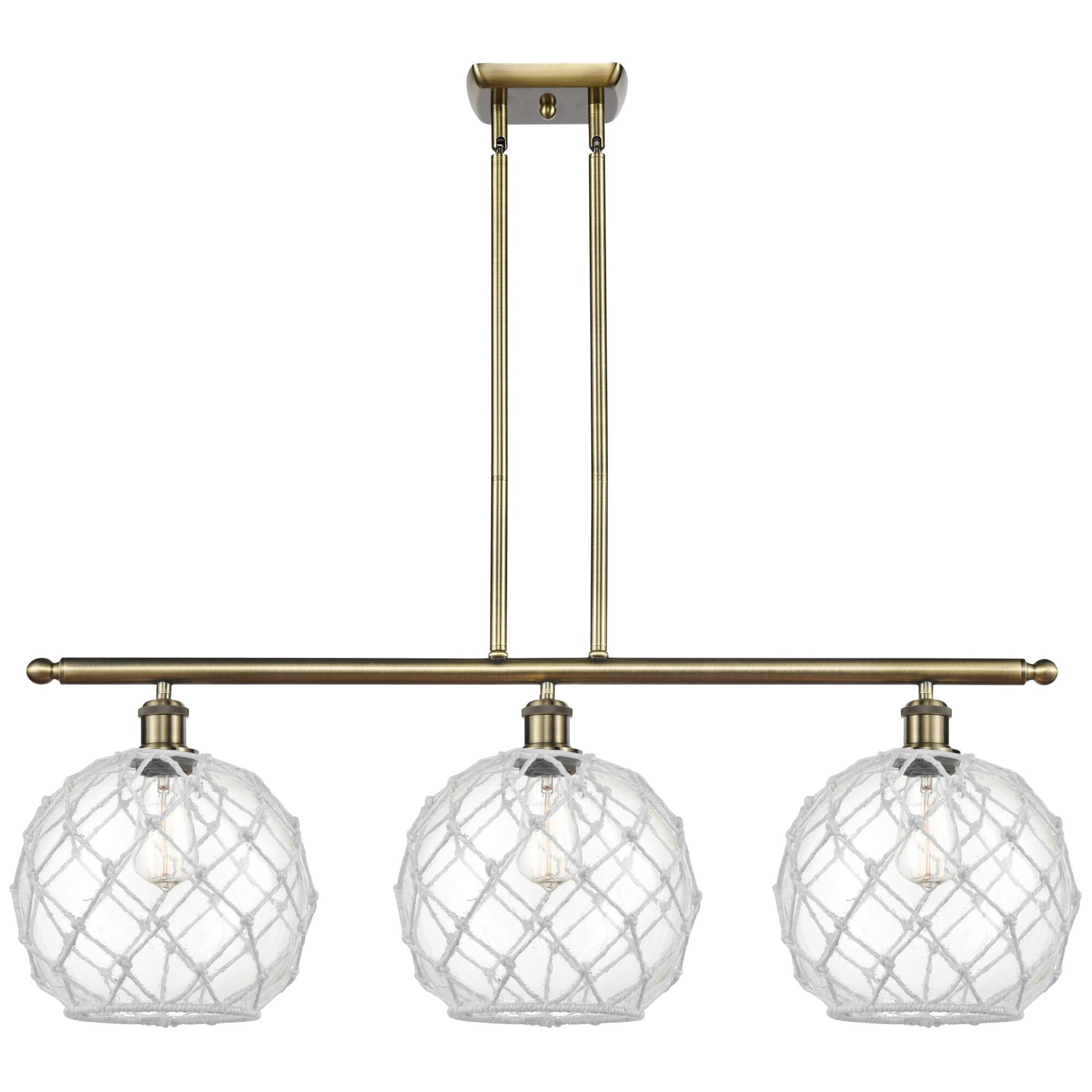 Shown in Antique Brass finish and Clear with White Rope glass