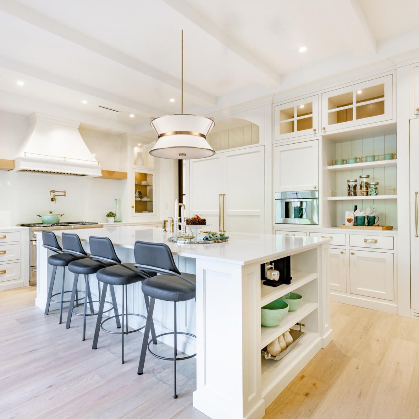 Shown in Brushed Brass finish and Etched glass and White Linen shade