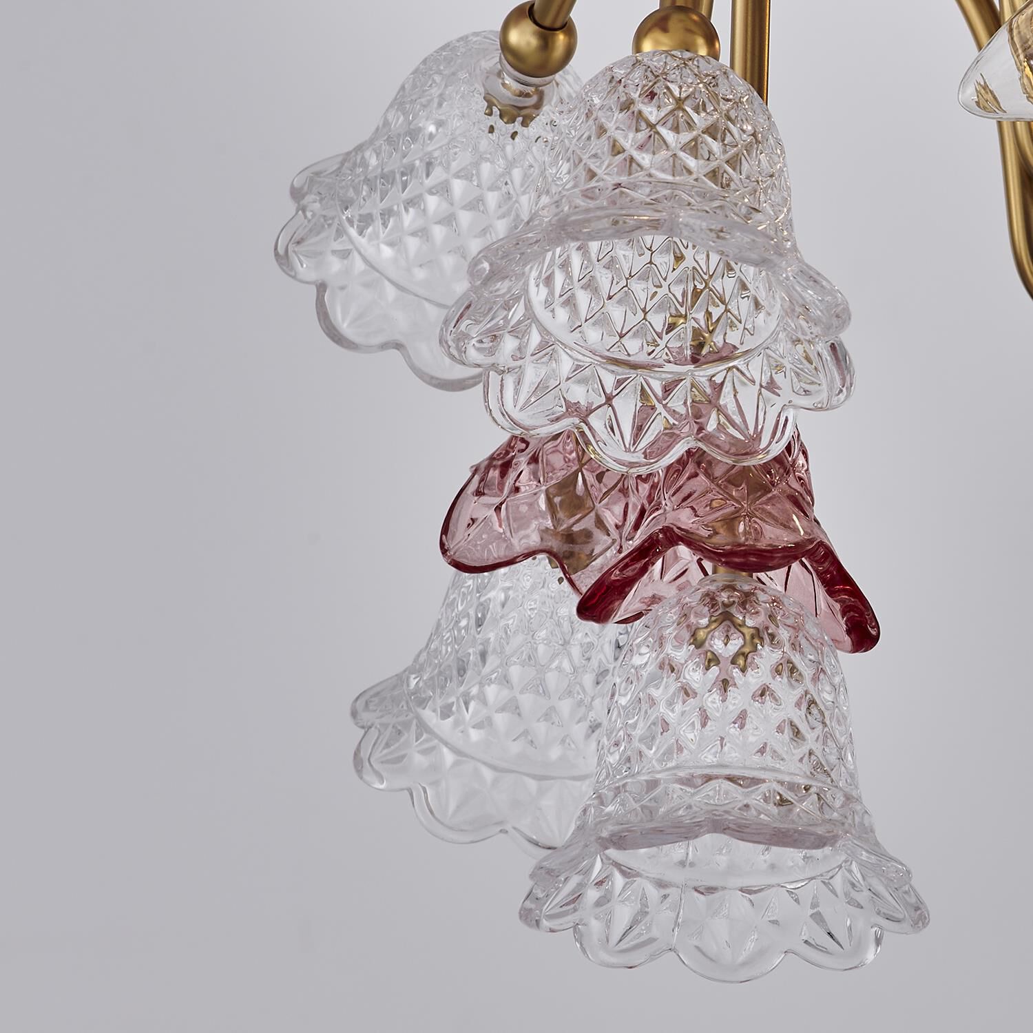 Shown in Antique Brass finish and Vintage Rose crystal