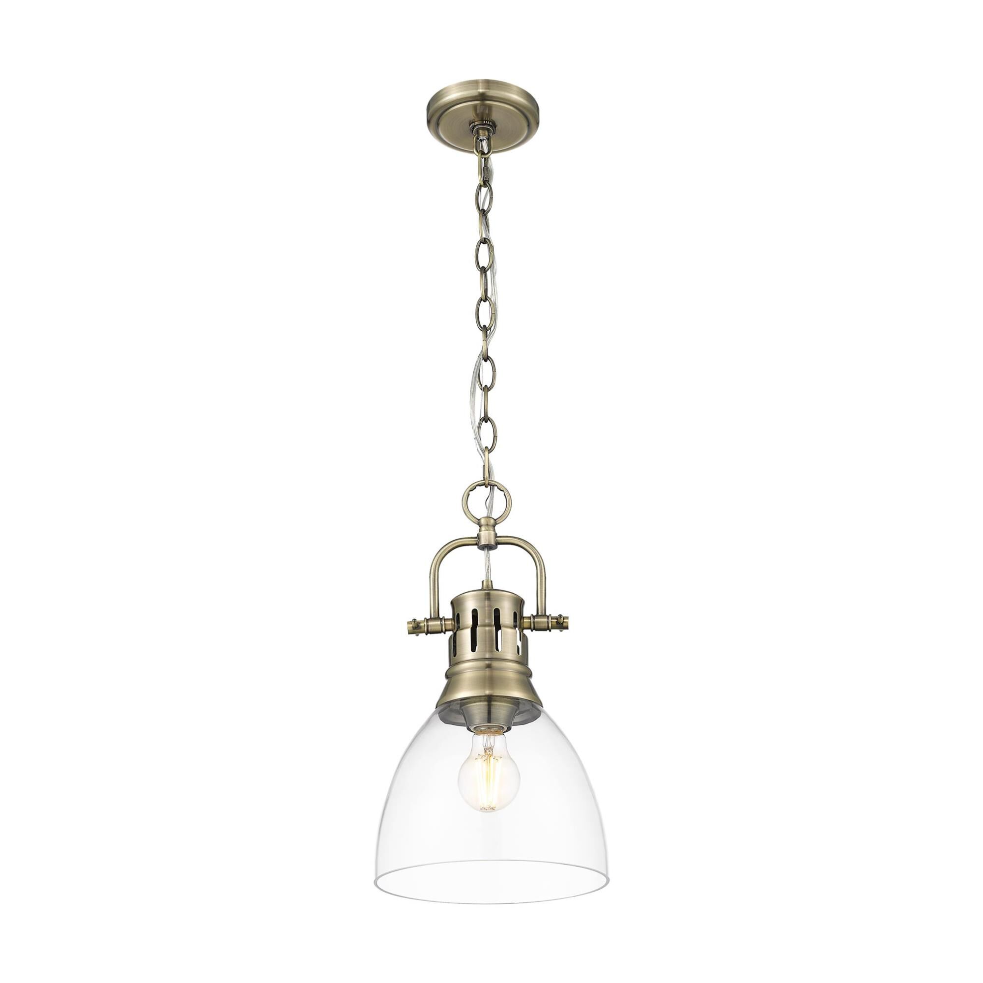 Shown in Aged Brass finish and Clear Glass shade