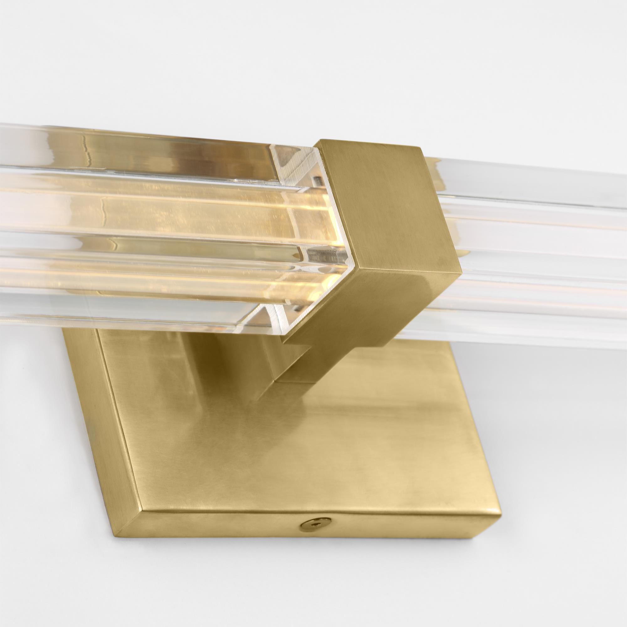 Shown in Hand-Rubbed Antique Brass finish and Clear Acrylic glass