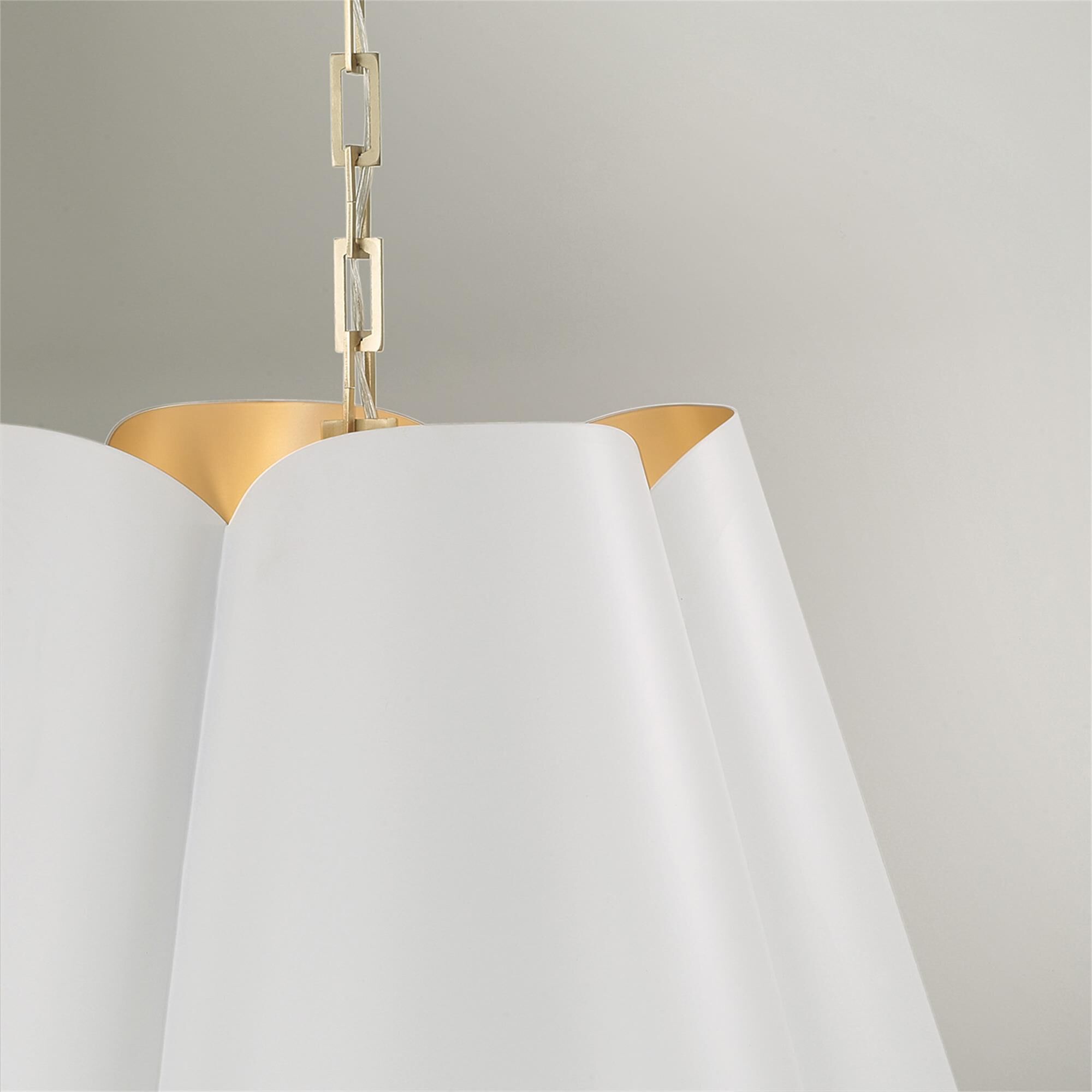 Shown in Matte Brass And White finish and White Metal  With Painted Matte Brass Interior shade