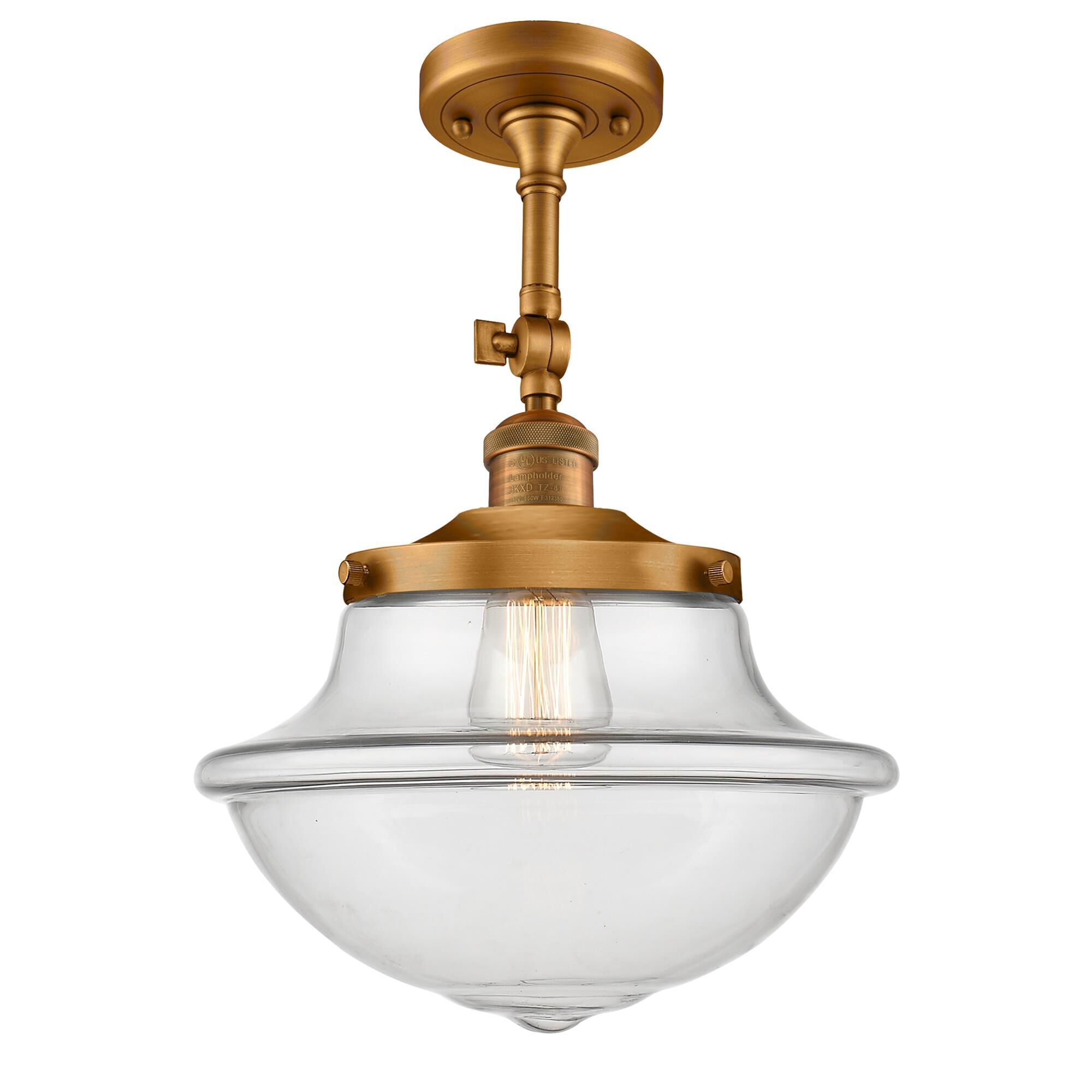 Shown in Brushed Brass finish and Clear glass