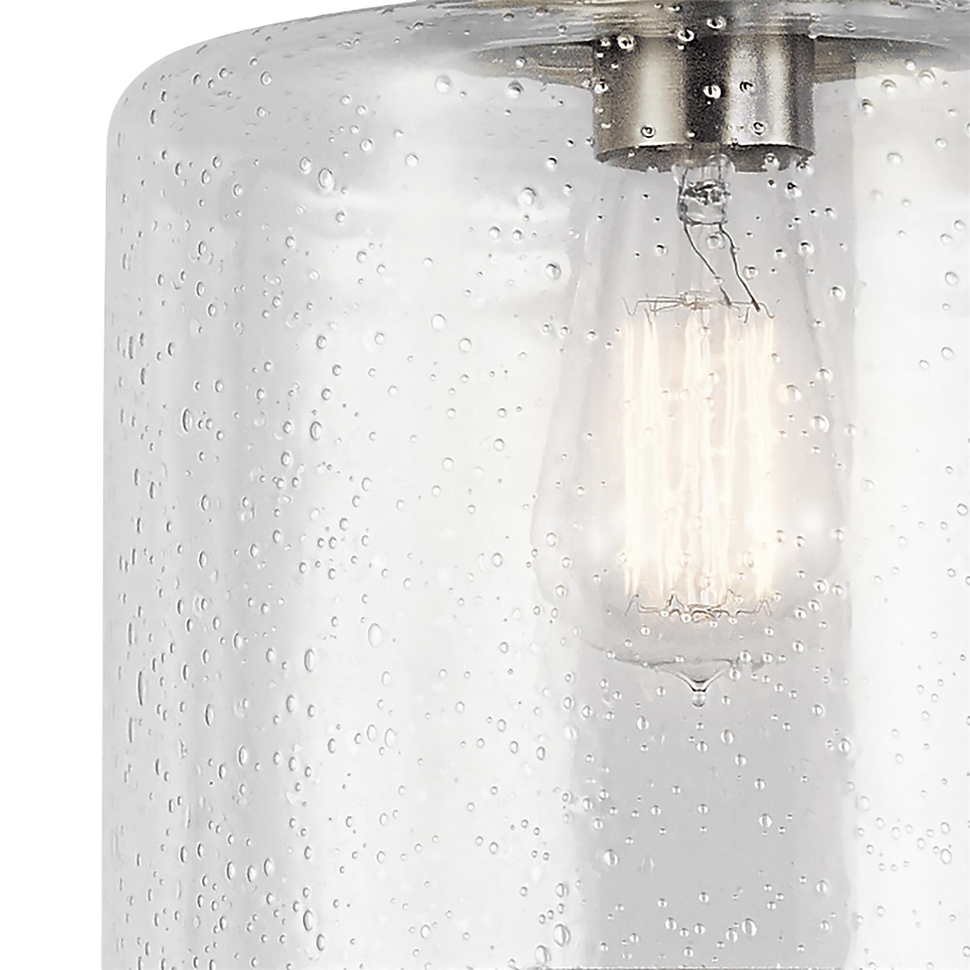 Shown in Brushed Nickel finish and Clear Seeded glass