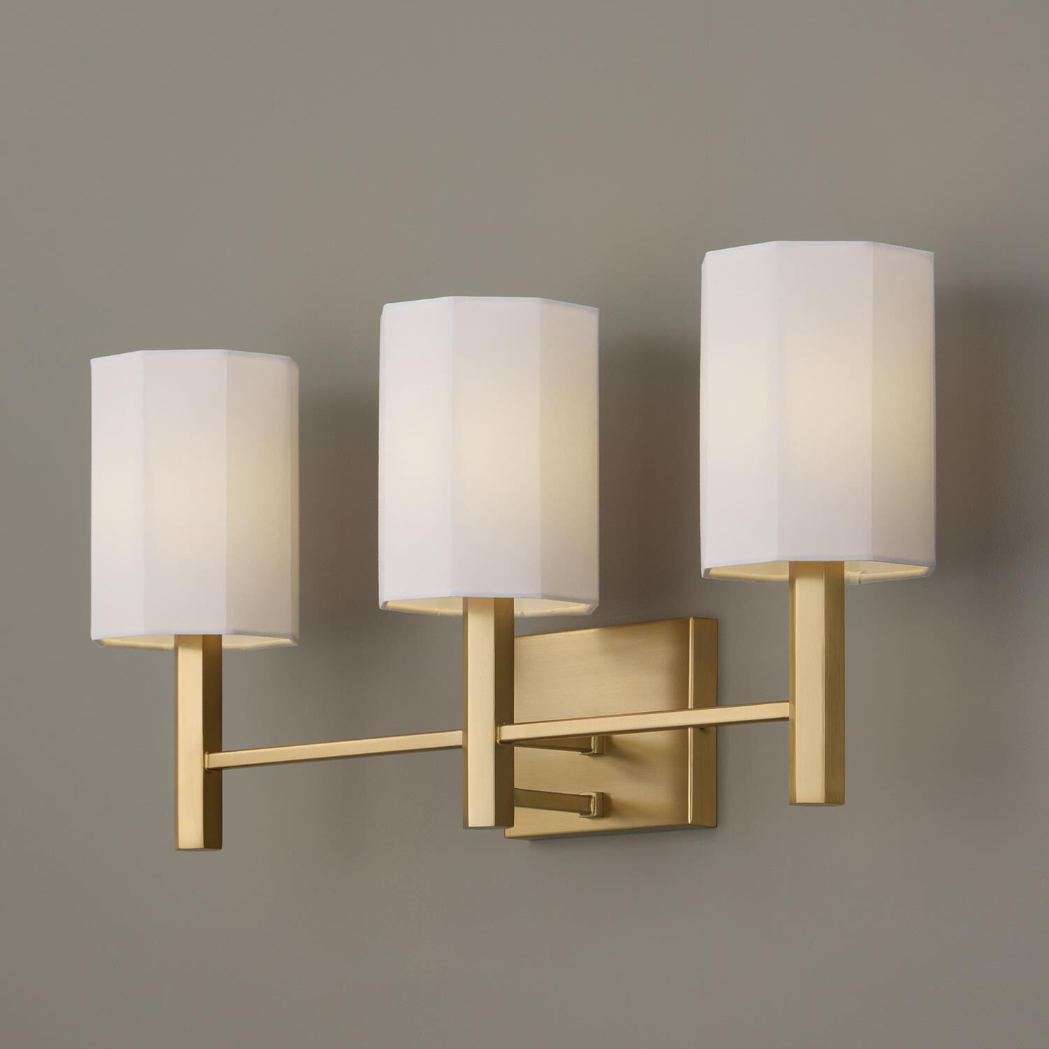 Shown in Aged Brass finish and White Fabric Octagonal s shade