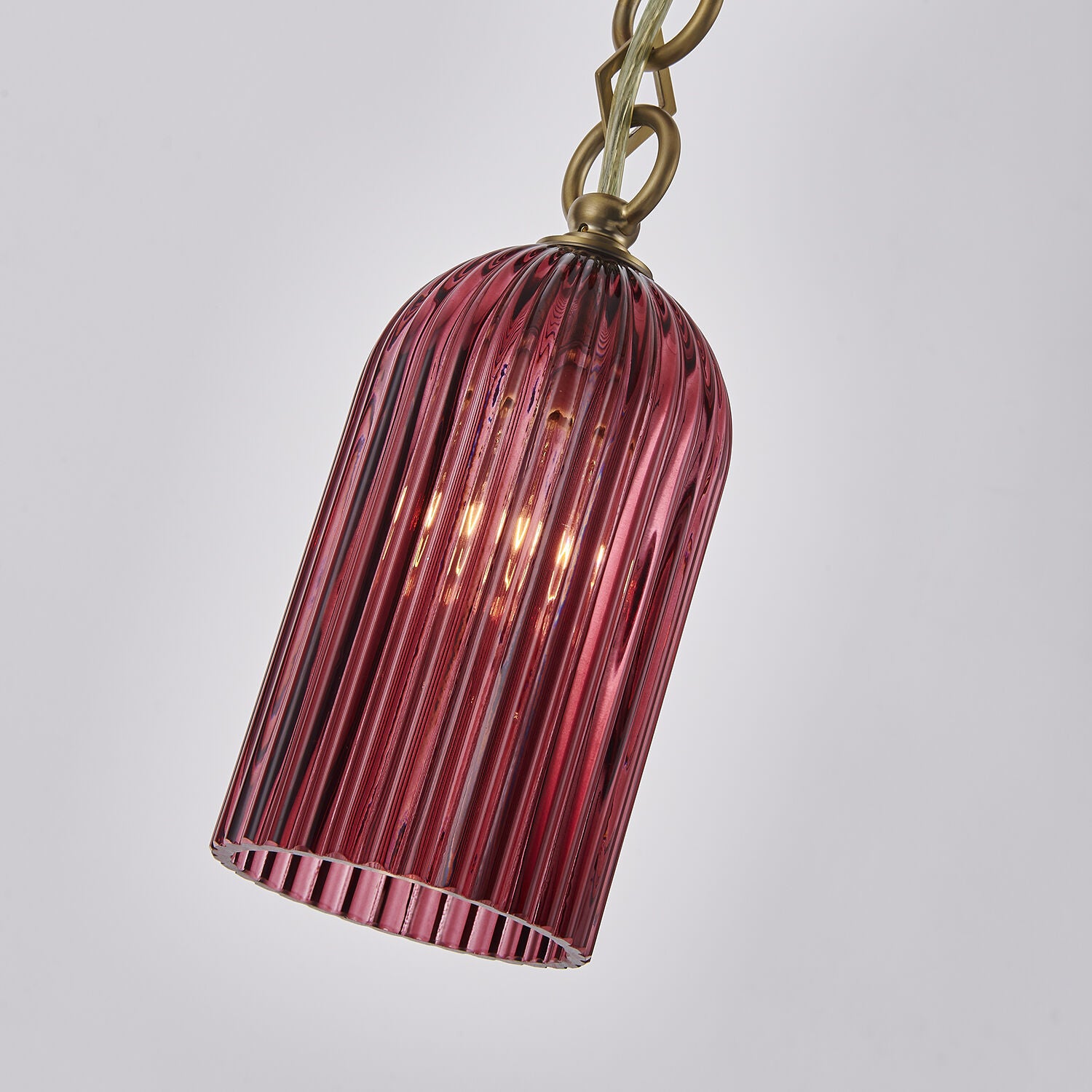 Shown in Satin Brass finish and Peacock Green glass