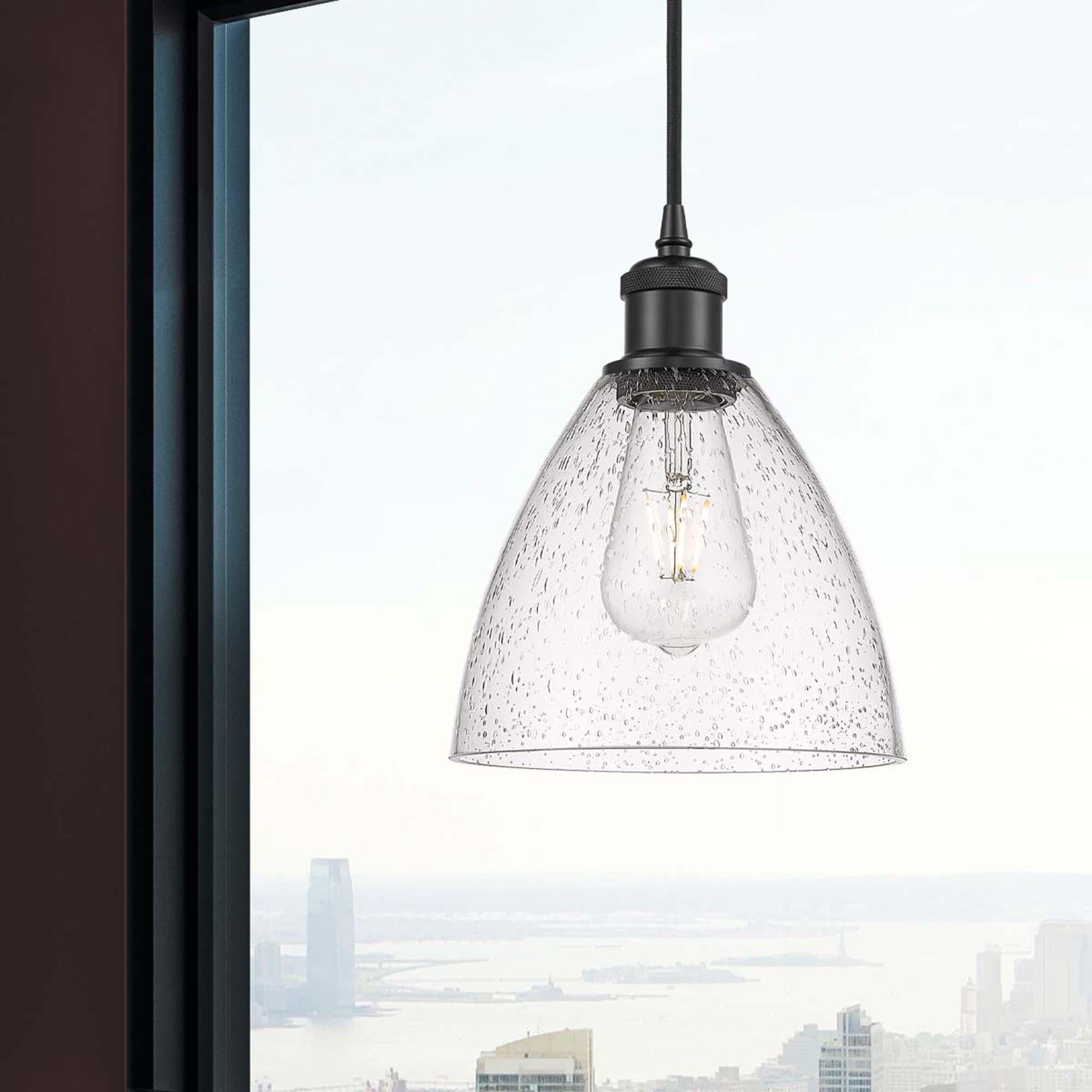 Shown in Matte Black finish and Seedy glass