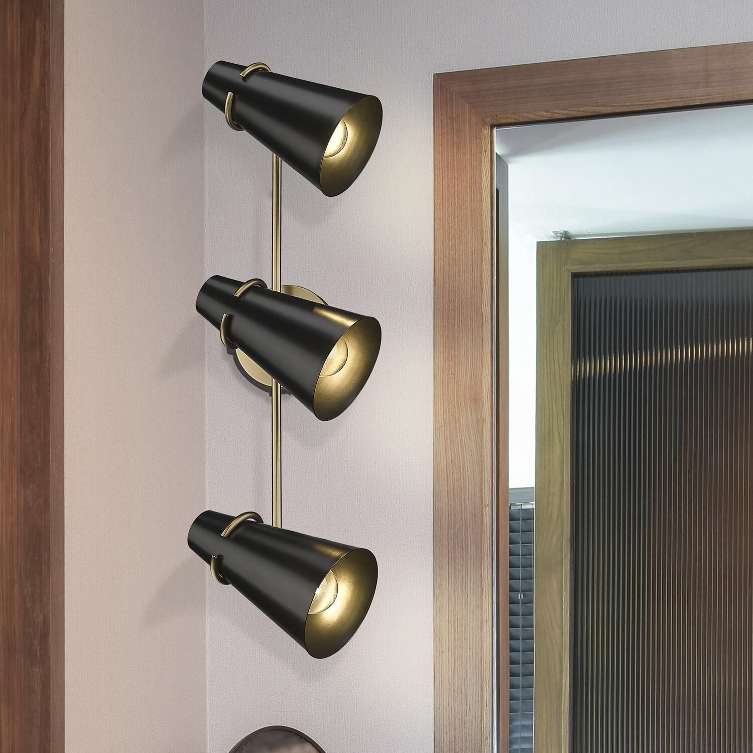 Shown in Modern Brass finish and Matte Black glass