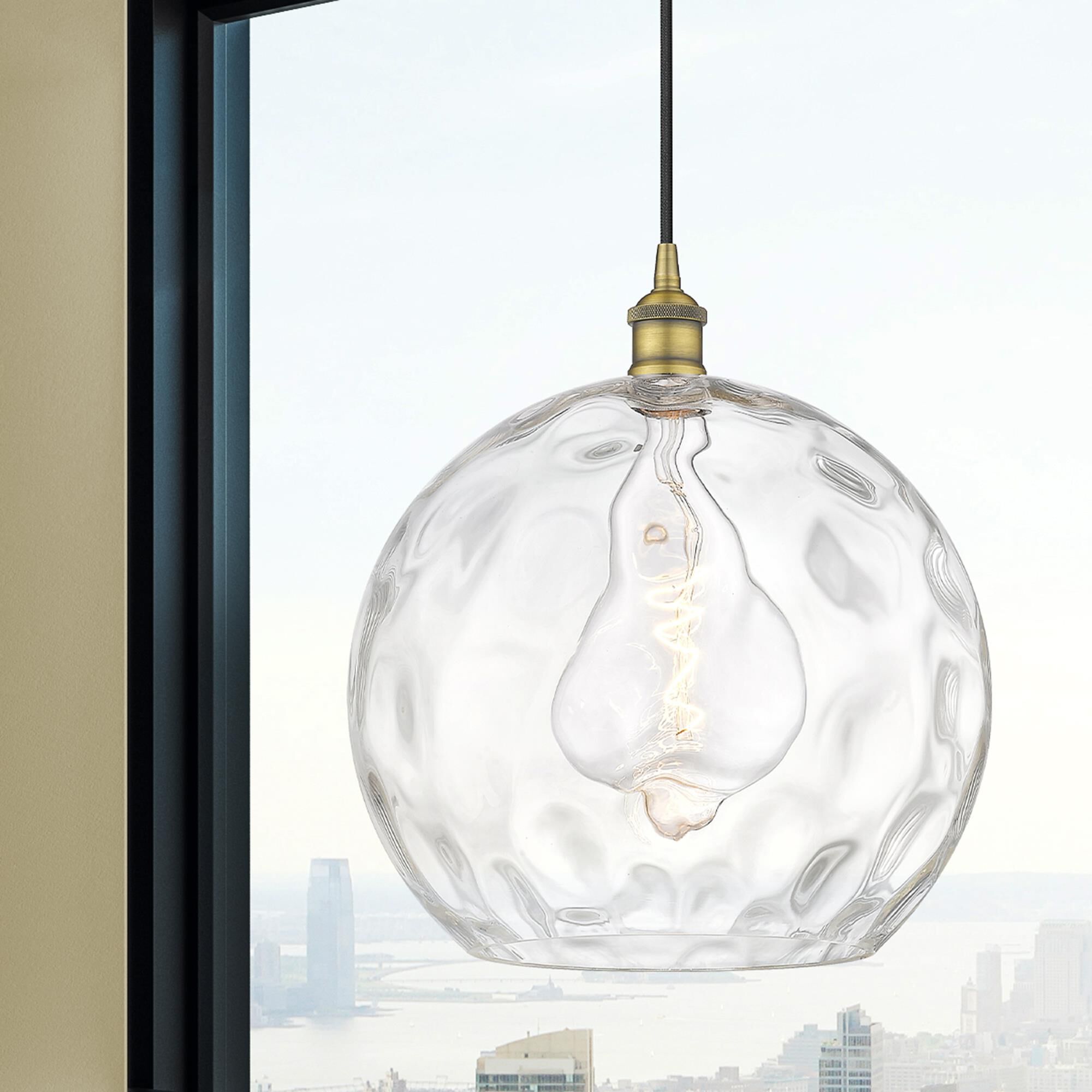 Shown in Brushed Brass finish and Clear glass
