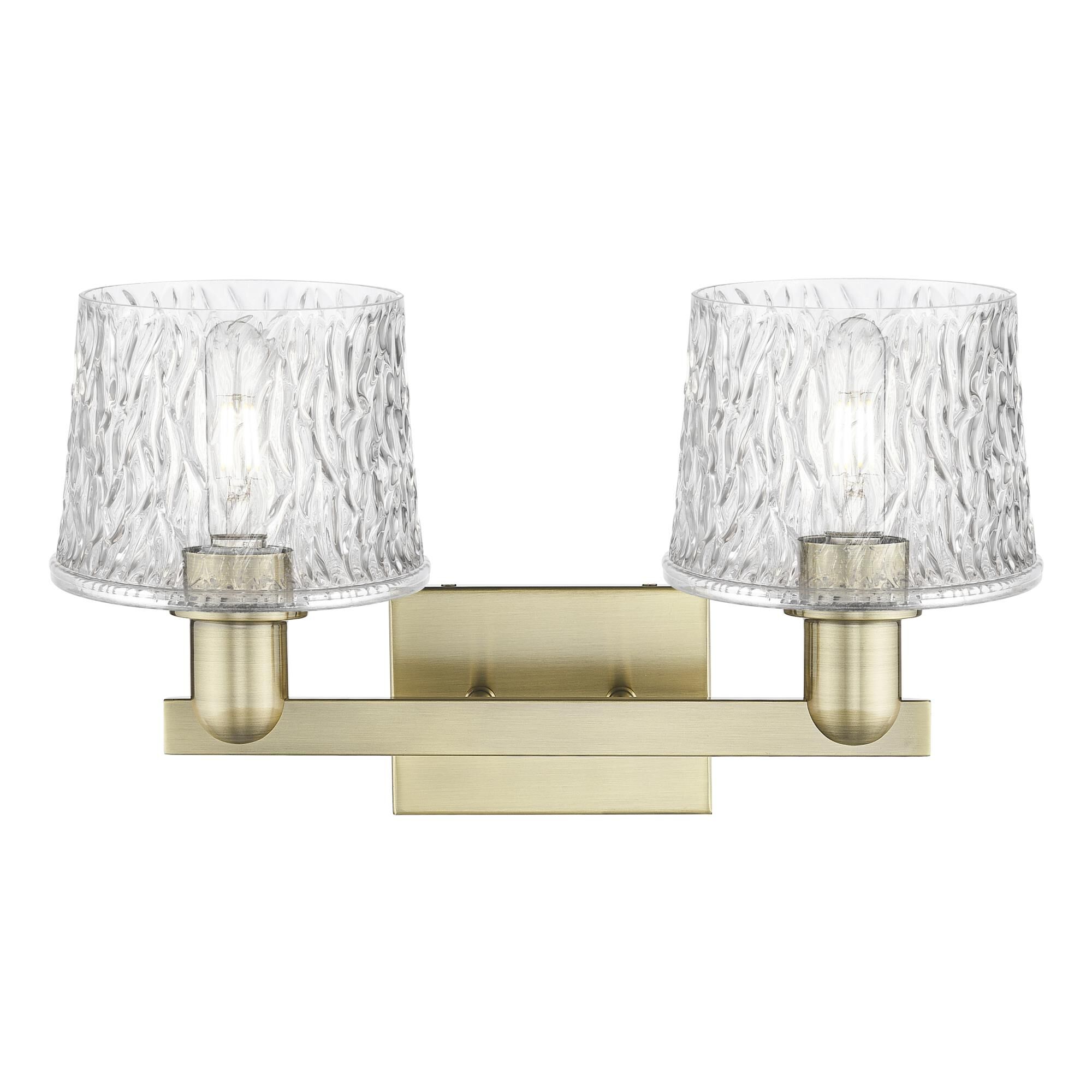 Shown in Antique Brass finish and Clear glass