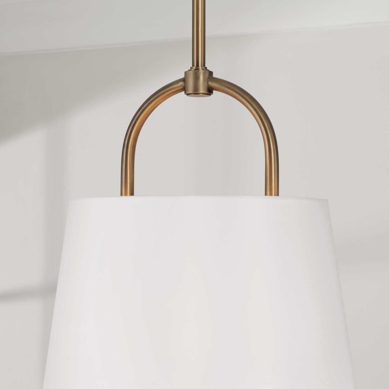 Shown in Aged Brass finish and White Fabric shade