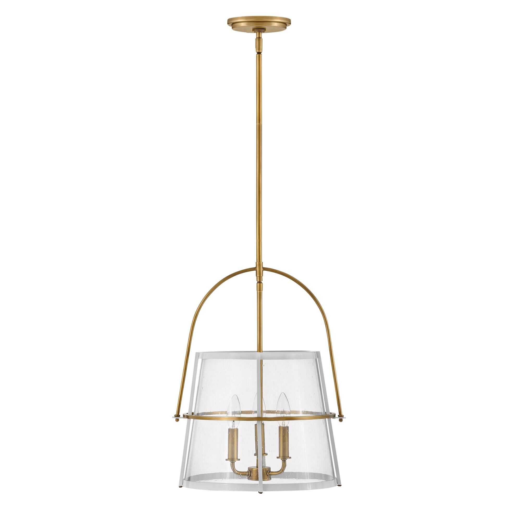 Shown in Heritage Brass with Polished White Accents finish and Clear Seedy glass