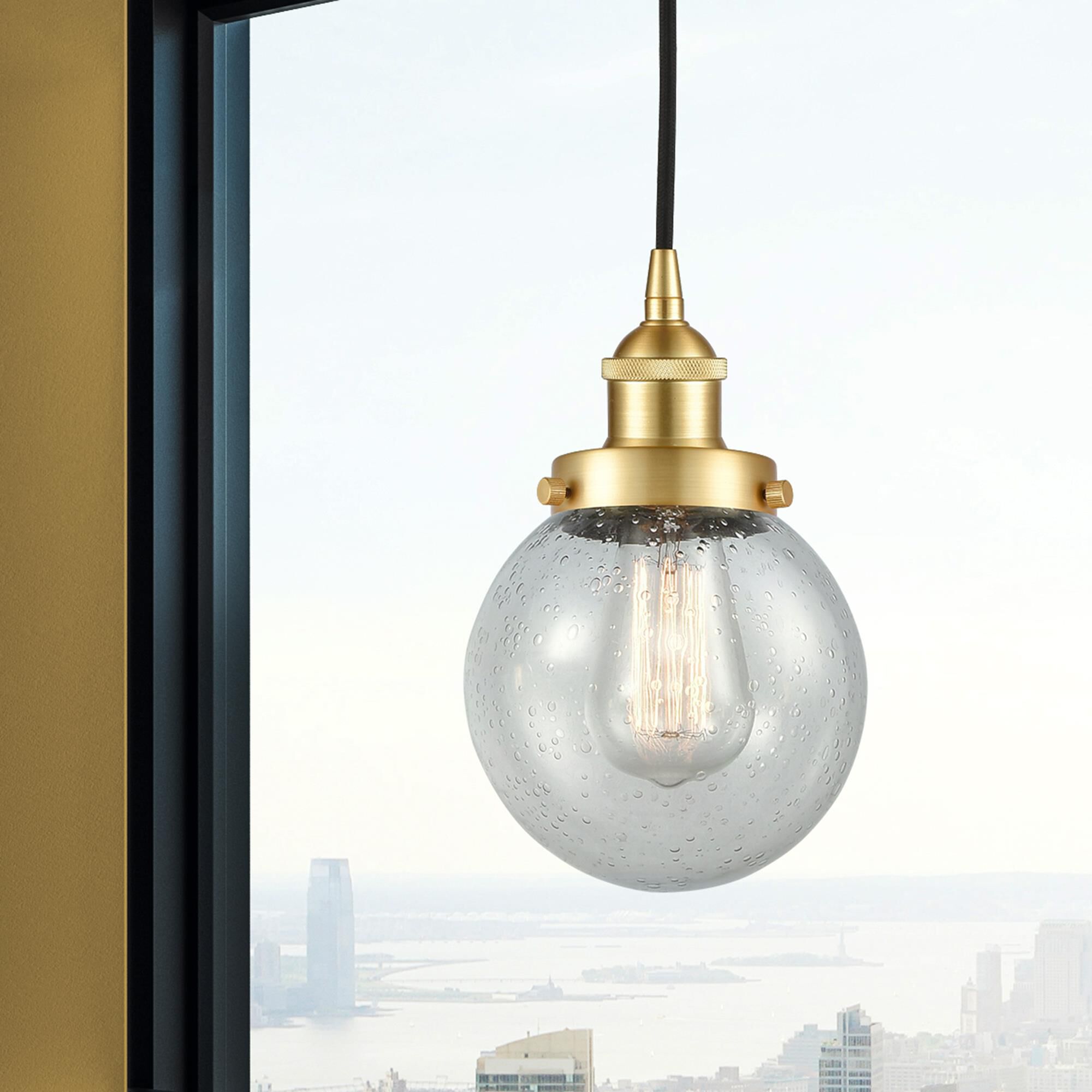 Shown in Satin Gold finish and Seedy glass