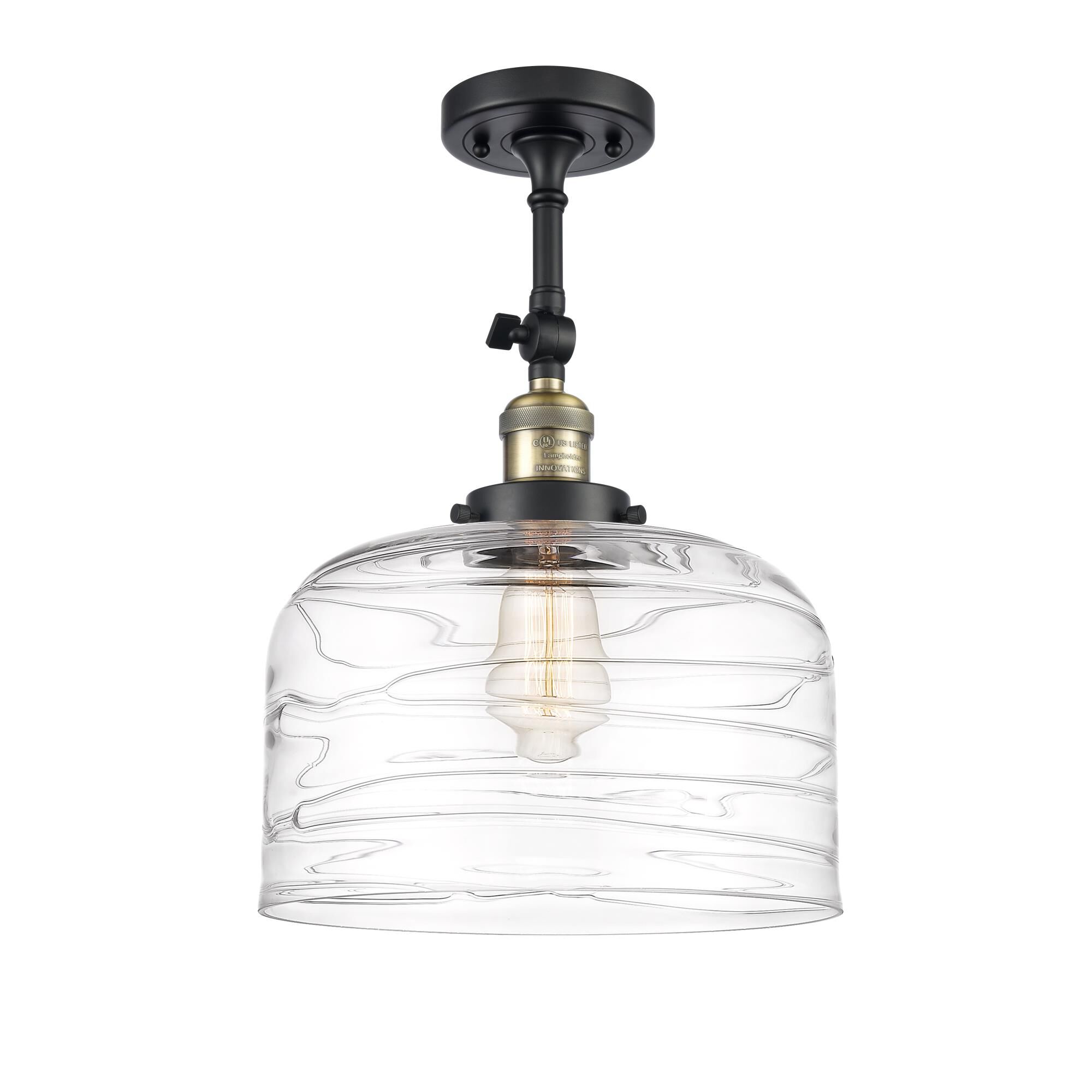 Shown in Black Antique Brass finish and Clear Deco Swirl X-Large Bell glass