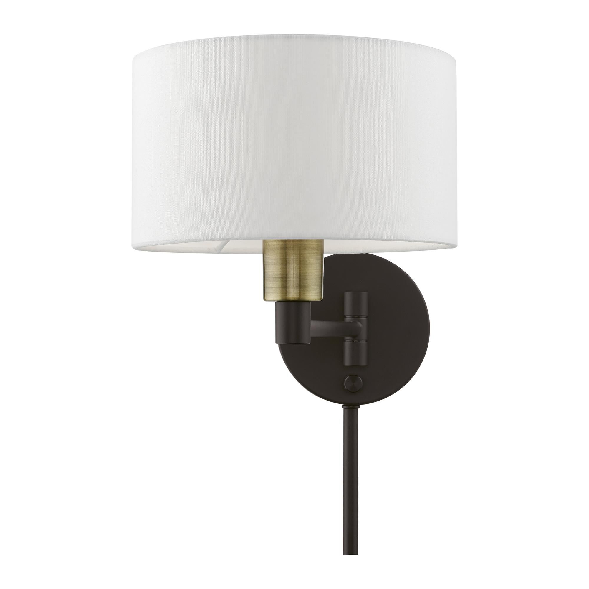 Shown in Bronze with Antique Brass Accent finish and Hand Crafted Off-White Hardback Fabric shade