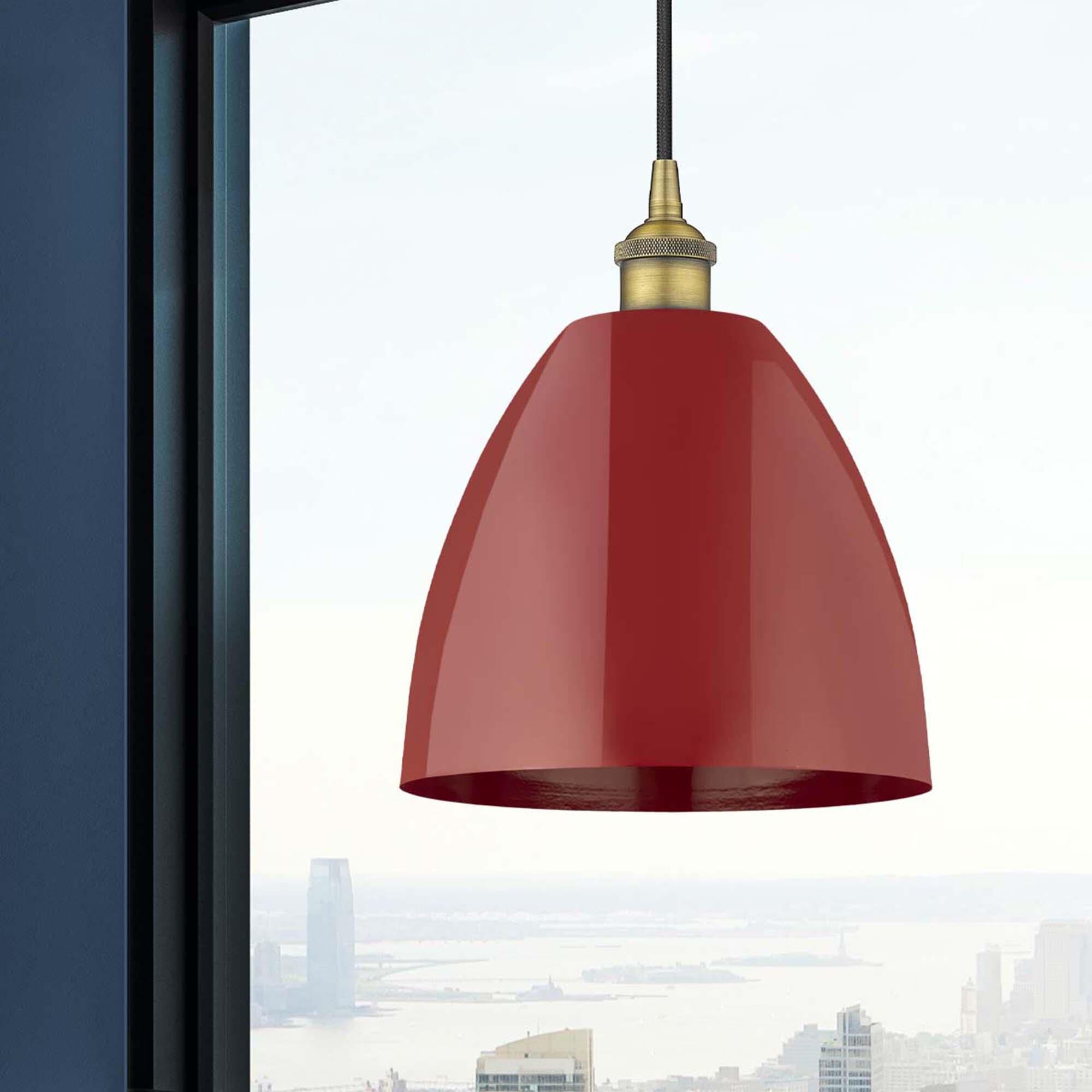 Shown in Brushed Brass finish and Red Plymouth Dome shade