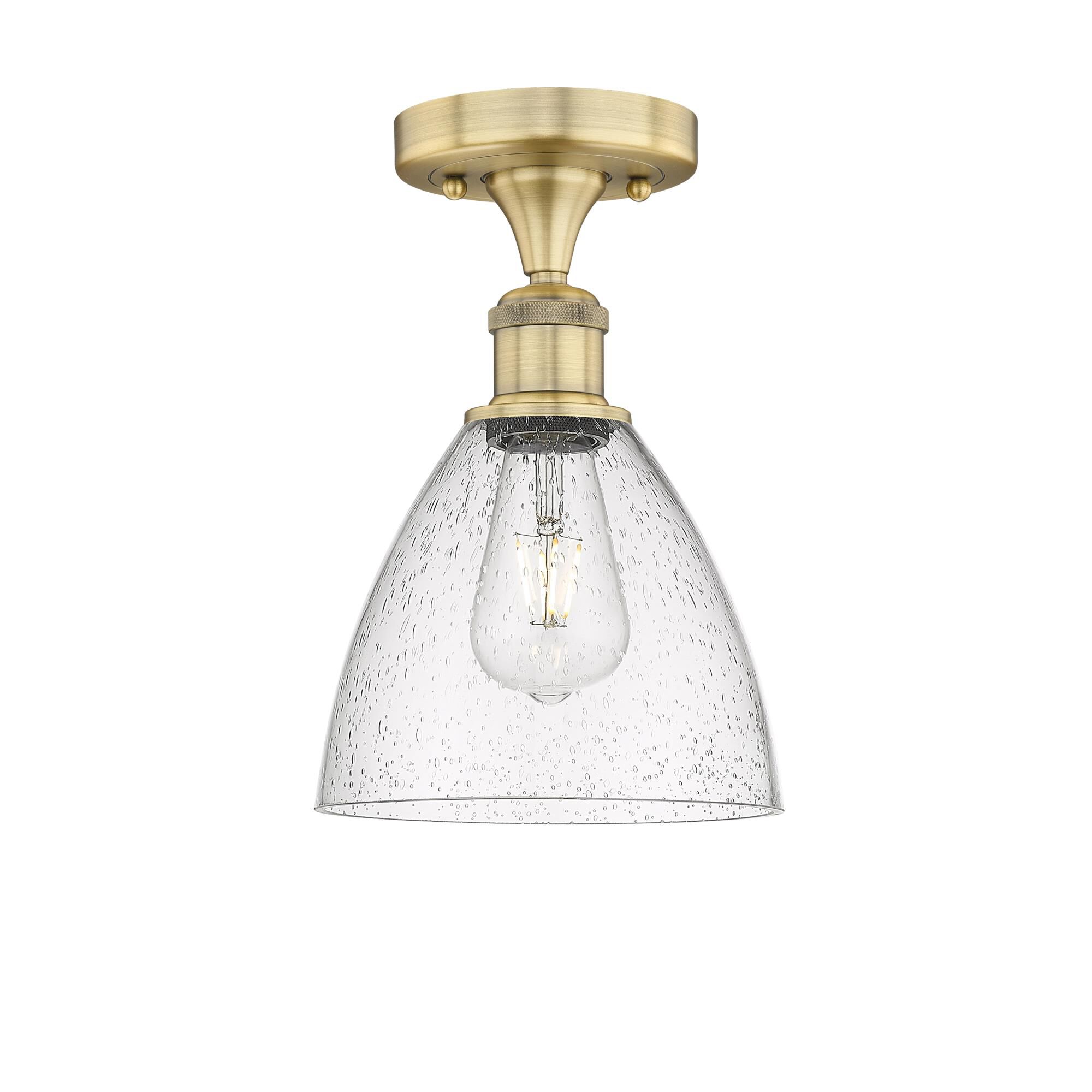 Shown in Brushed Brass finish and Seedy glass