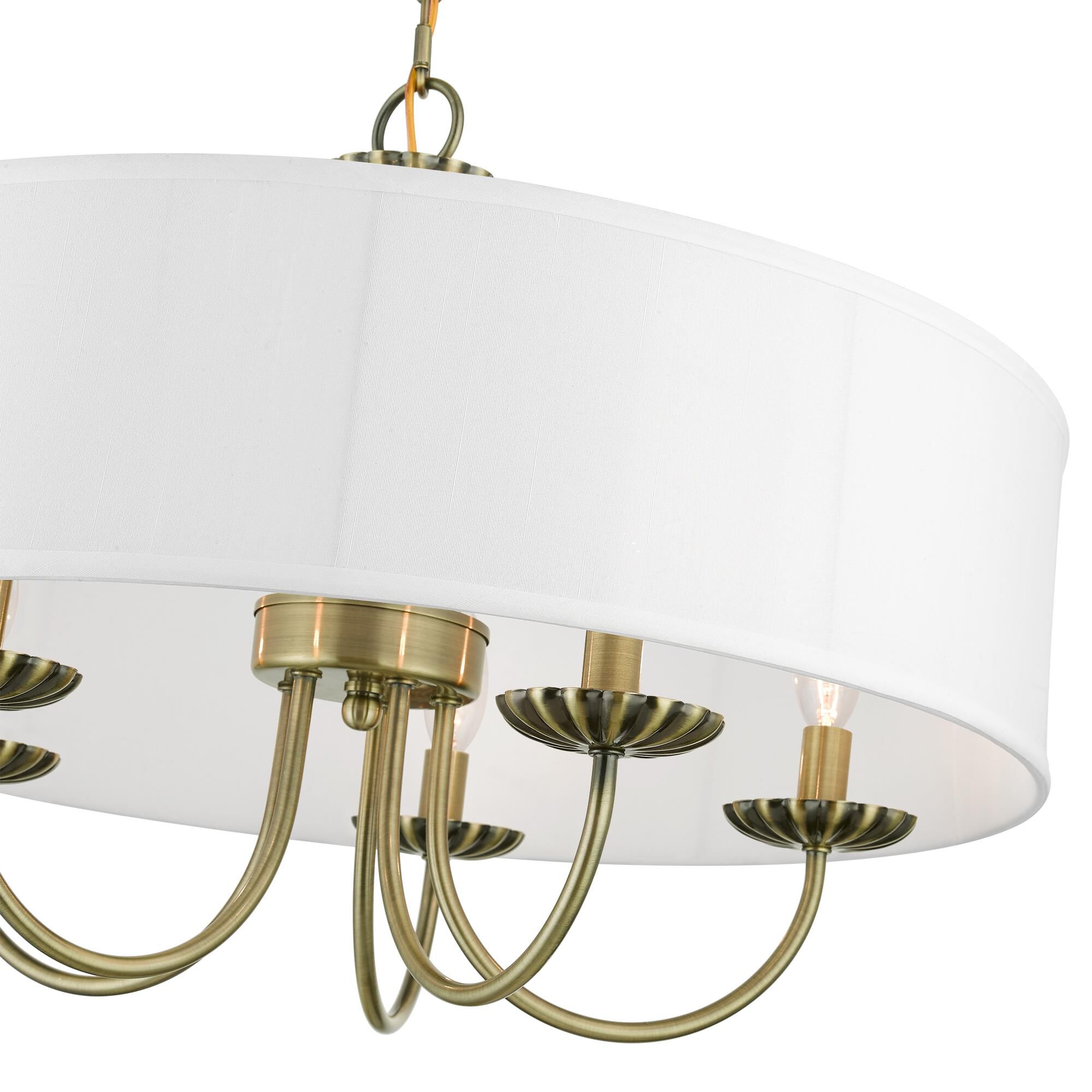 Shown in Antique Brass finish and Off-White Fabric Hardback with White Fabric Inside shade