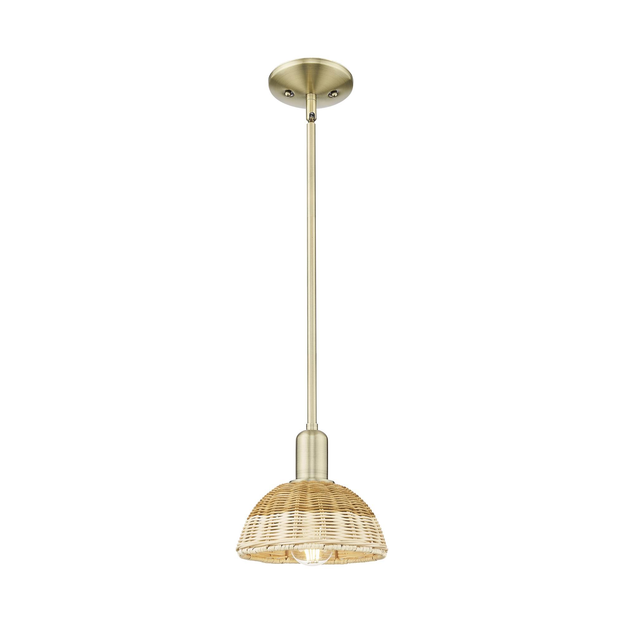 Shown in Antique Brass finish and Natural shade