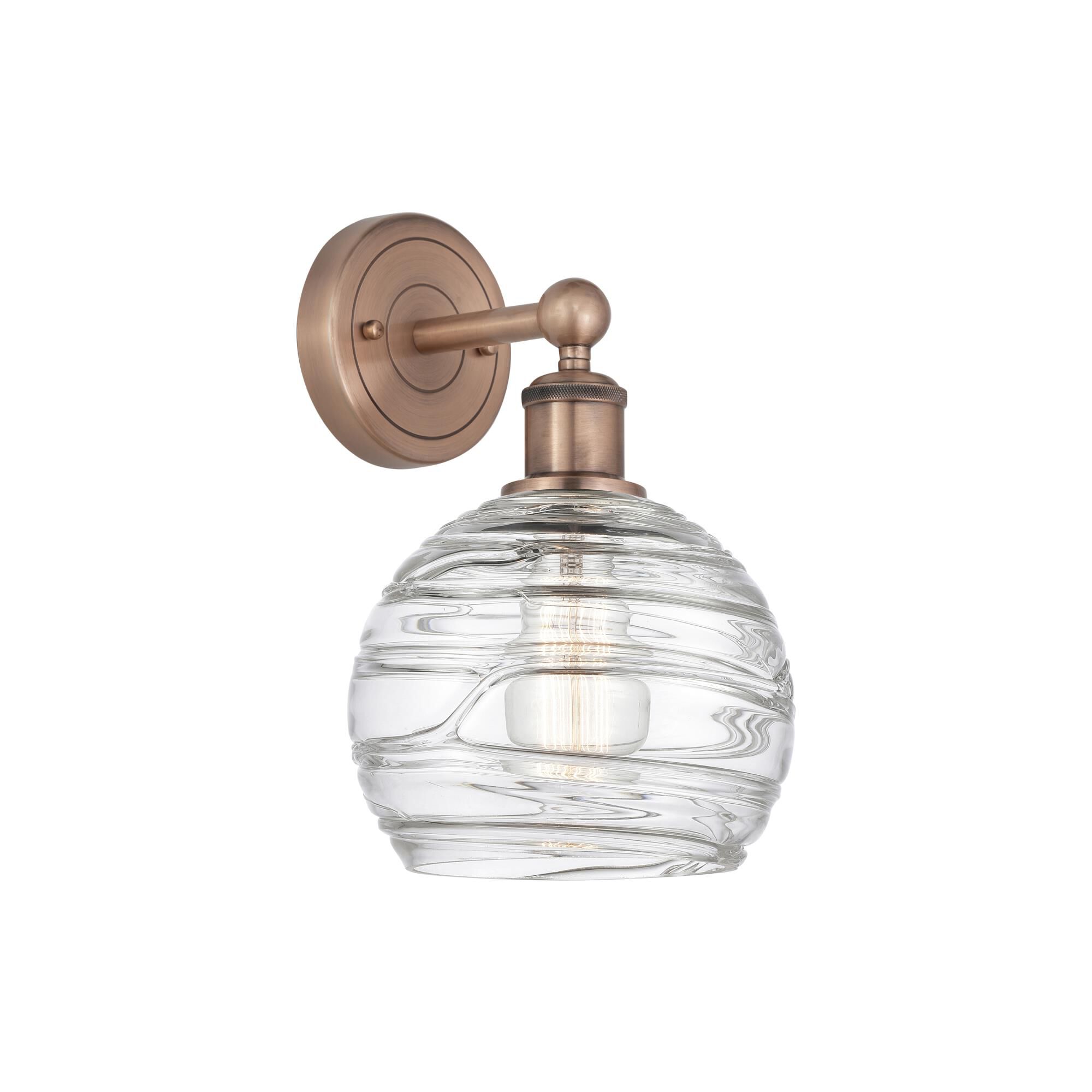 Shown in Antique Copper finish and Clear Deco Swirl glass