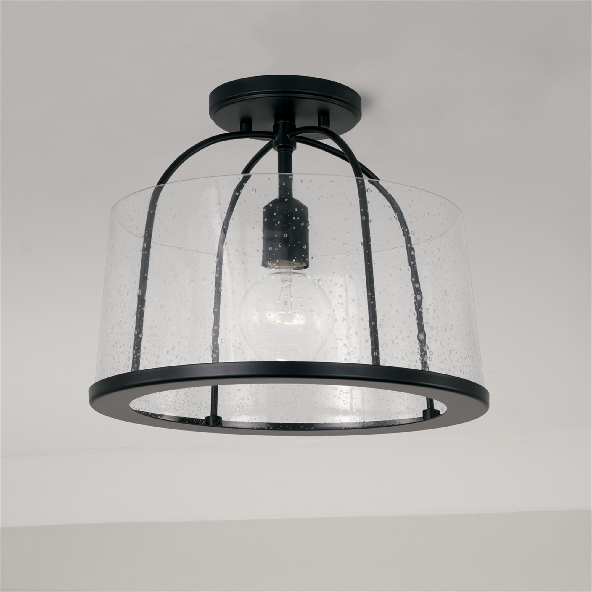 Shown in Matte Black finish and Clear Seeded glass