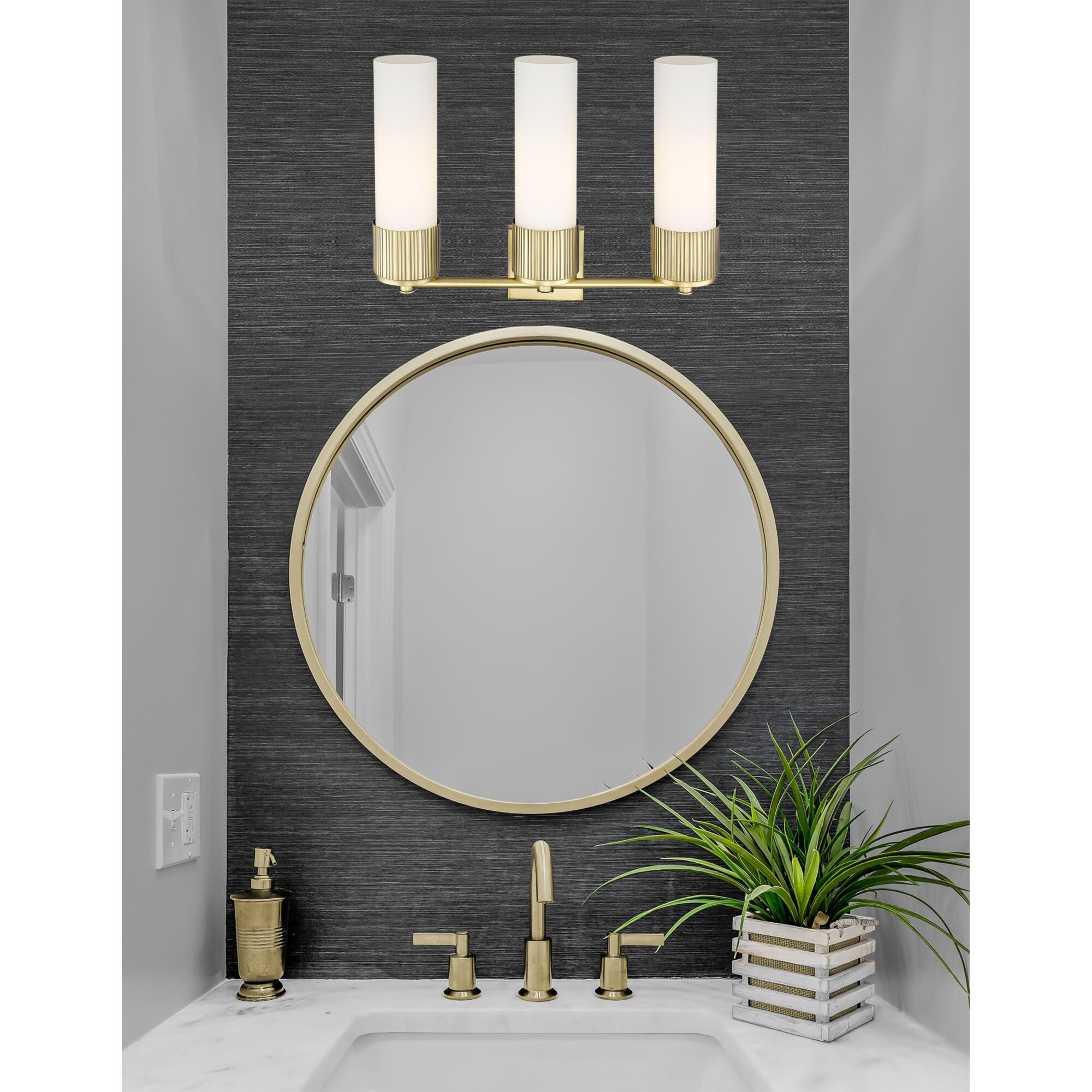 Shown in Brushed Brass finish and Matte White glass