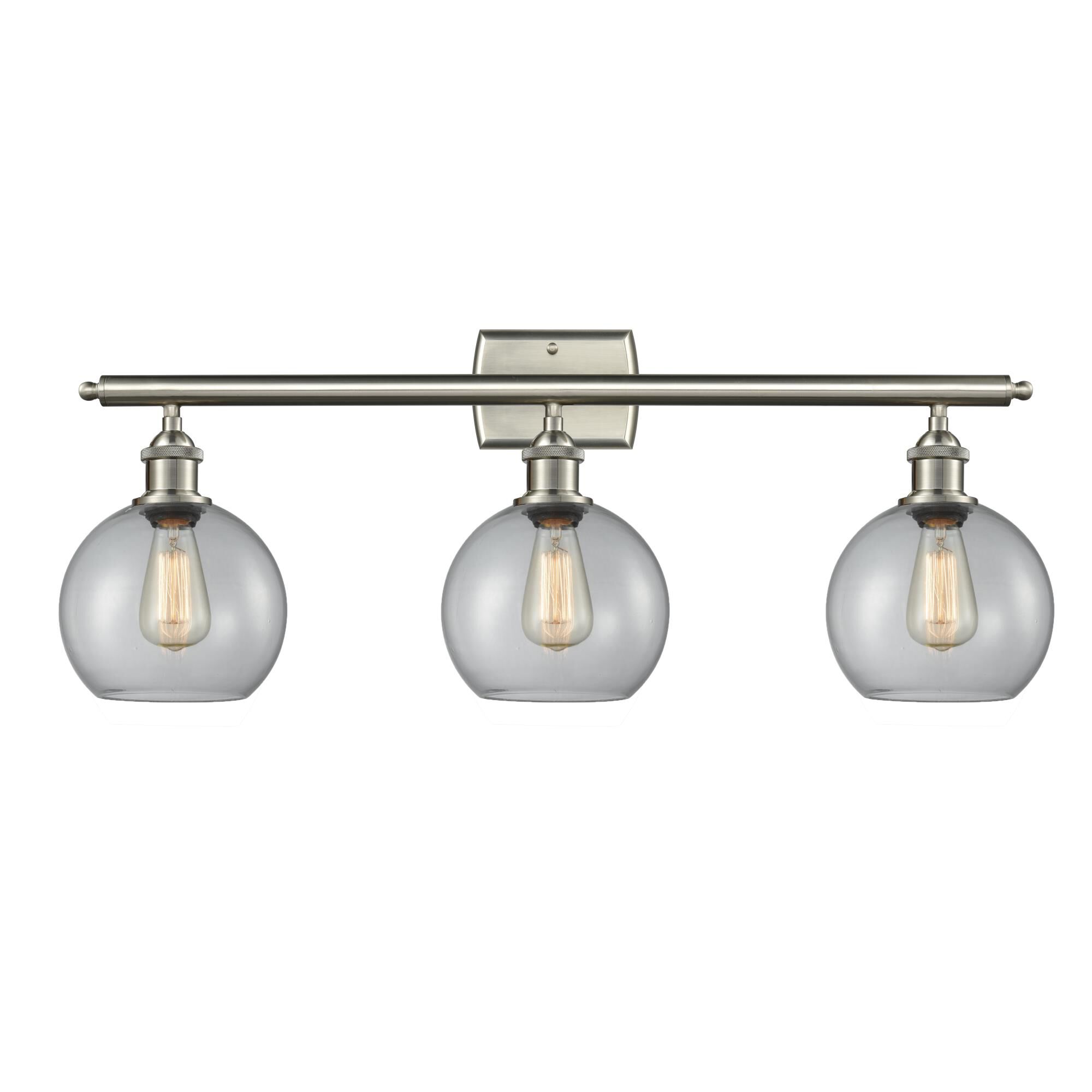 Shown in Brushed Satin Nickel finish and Clear Globe glass