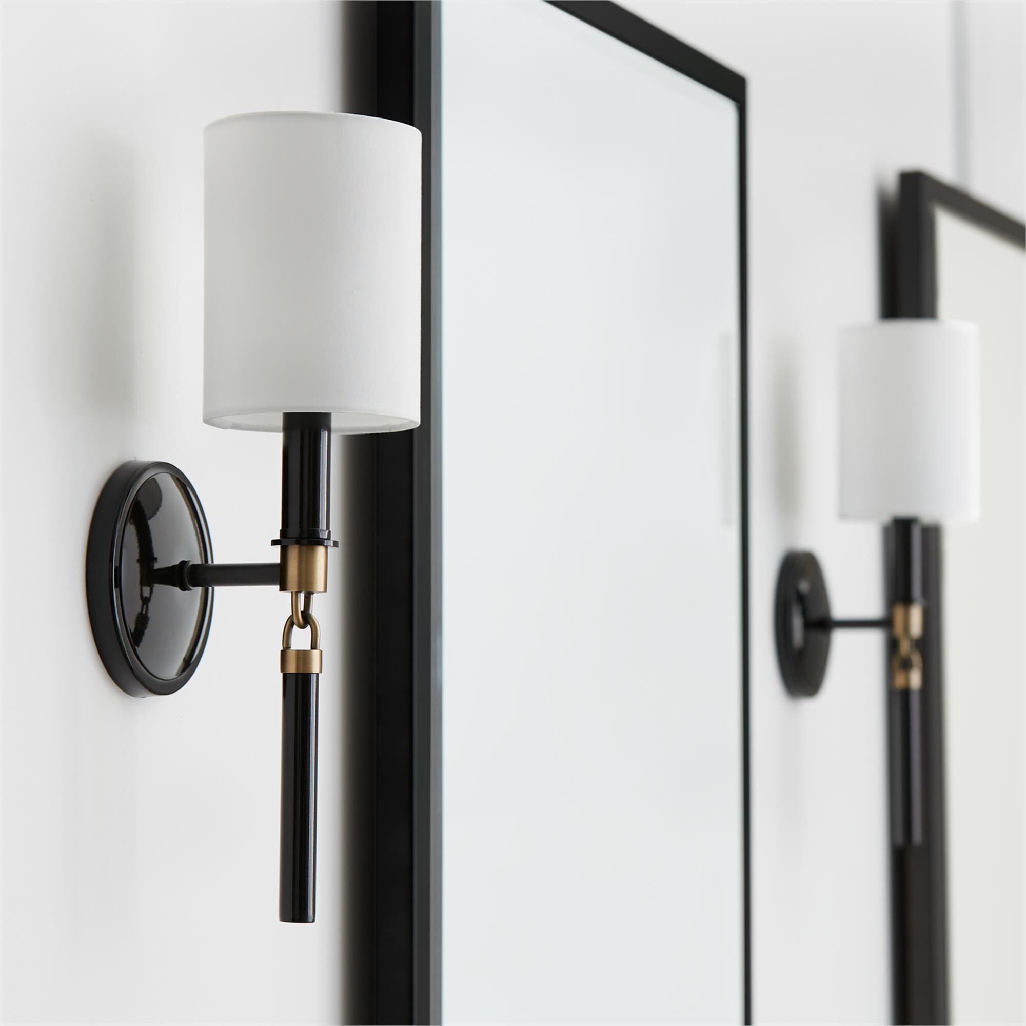Shown in Glossy Black And Aged Brass finish and 700 glass and White Fabric Stay-Straight shade