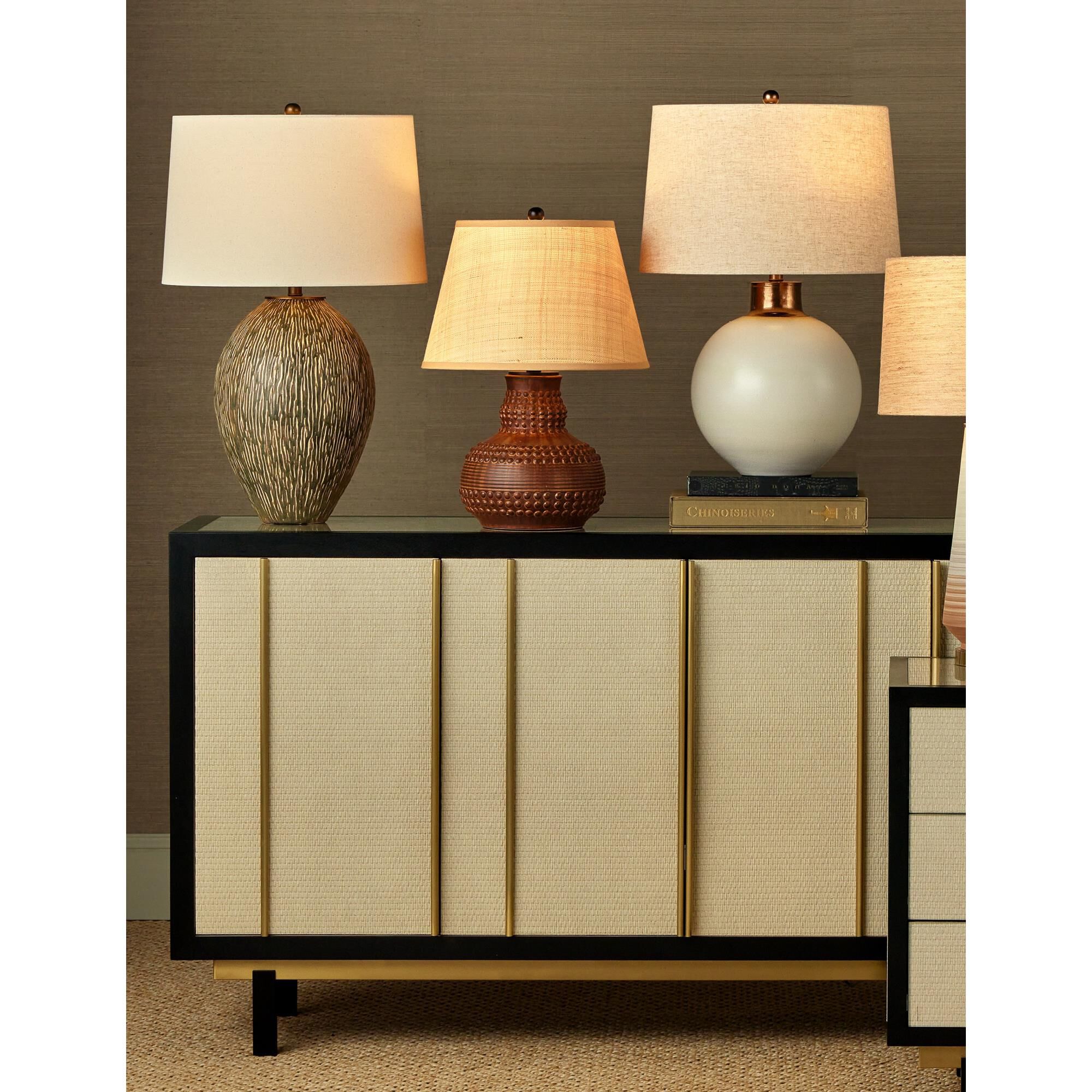 Shown in Dark Brown and Rustic Black finish and Natural Raffia shade