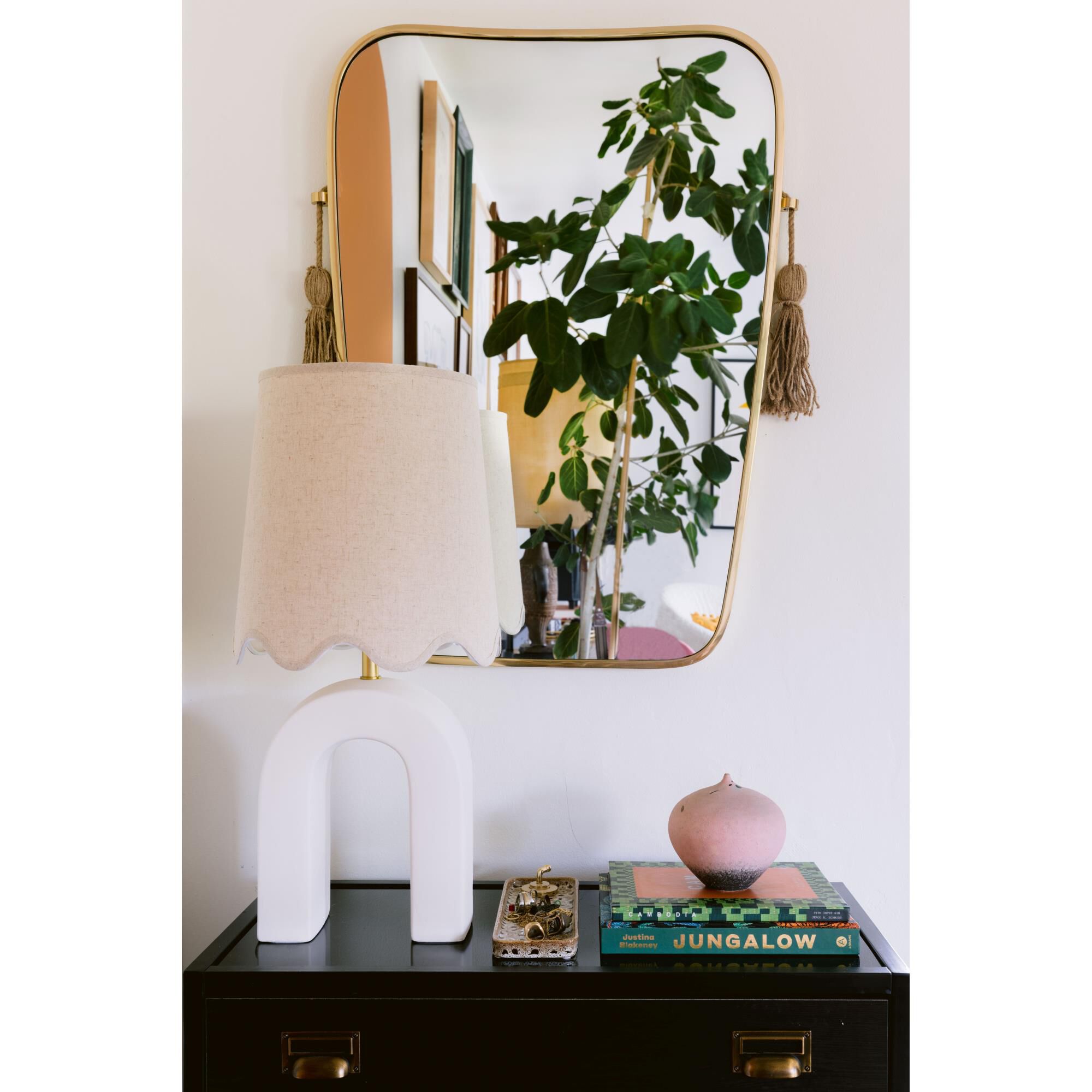 Shown in Aged Brass and Ceramic Raw Matte White finish and Natural Linen shade