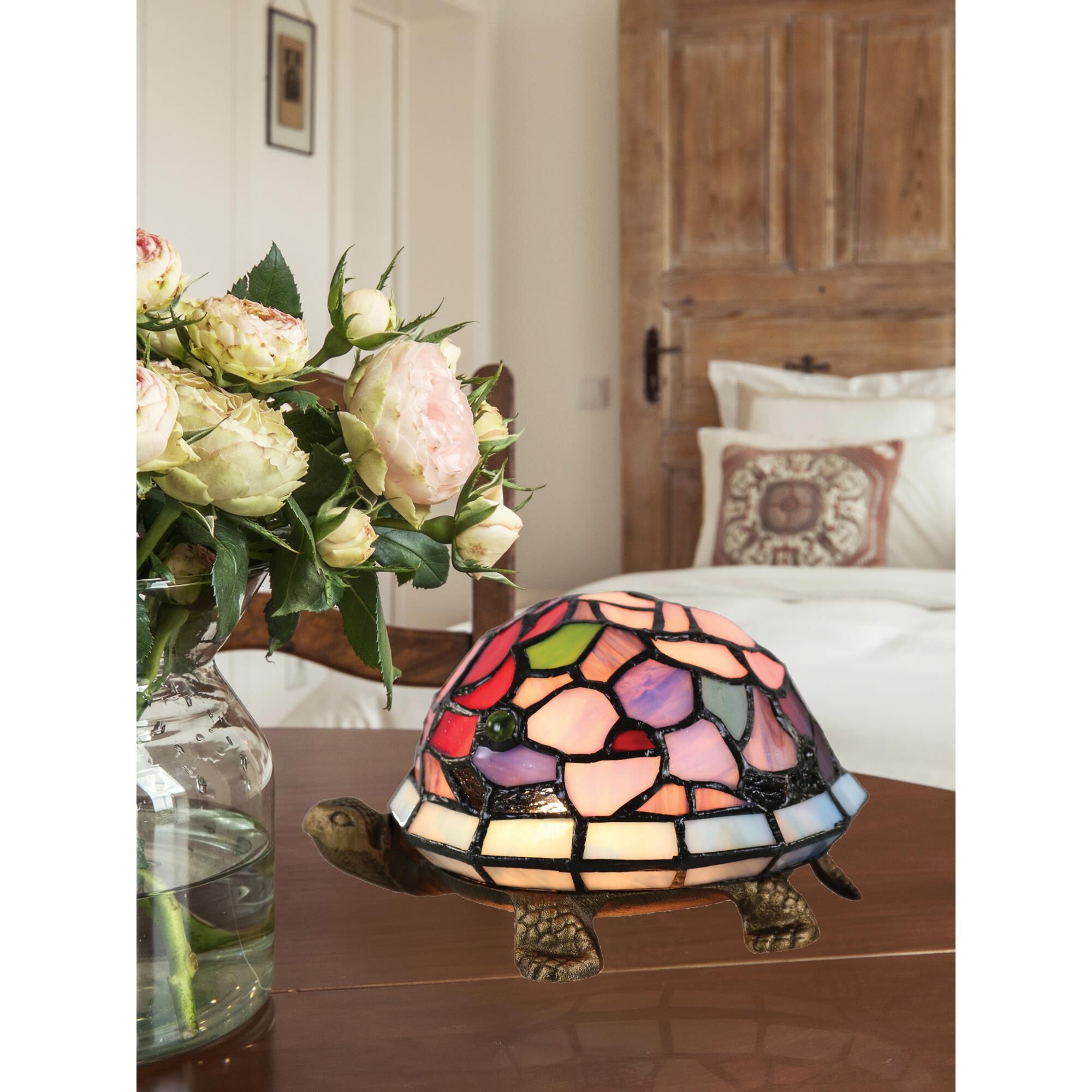Shown in Antique Bronze finish and Hand Rolled Art Glass (Tiffany) shade