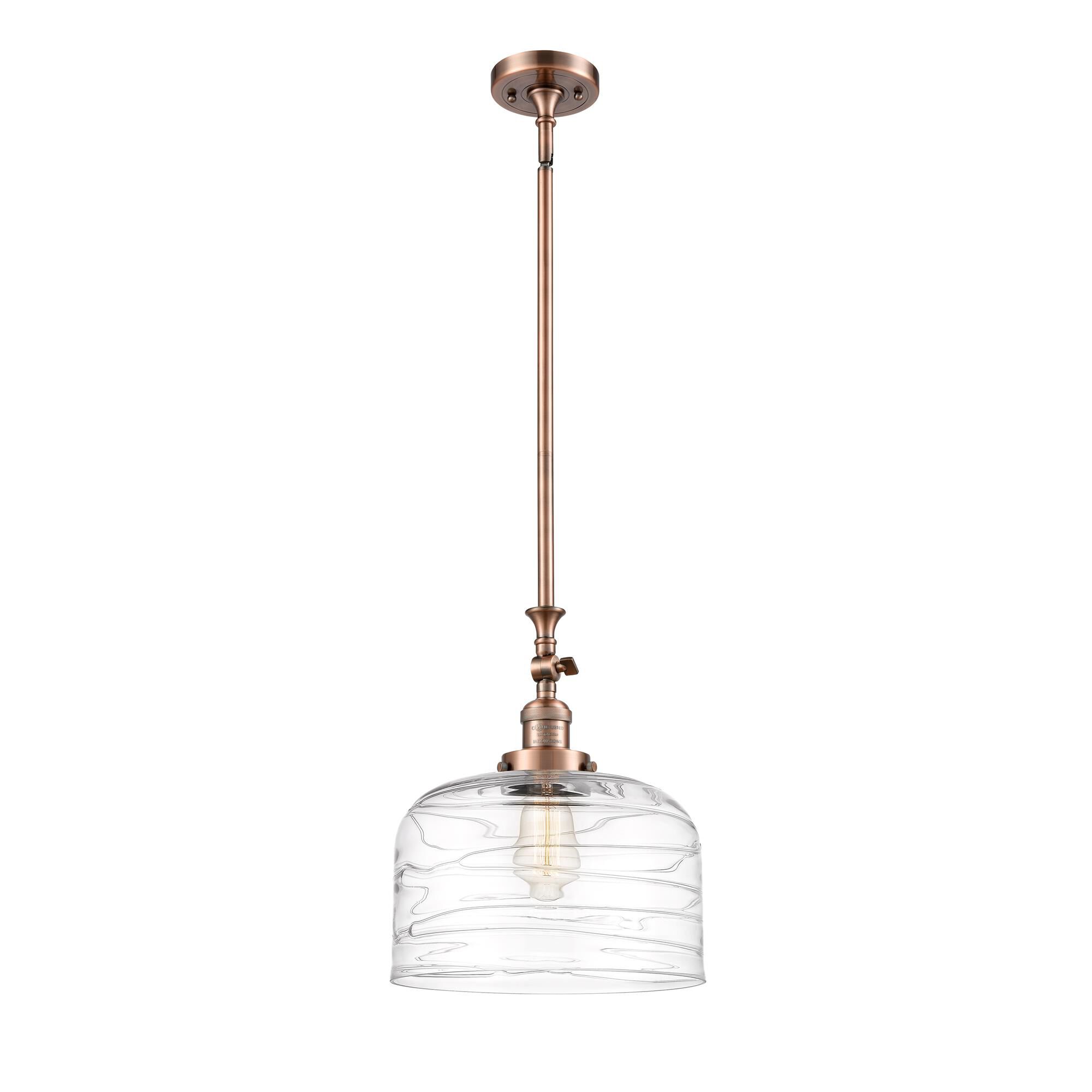 Shown in Antique Copper finish and Clear Deco Swirl X-Large Bell glass