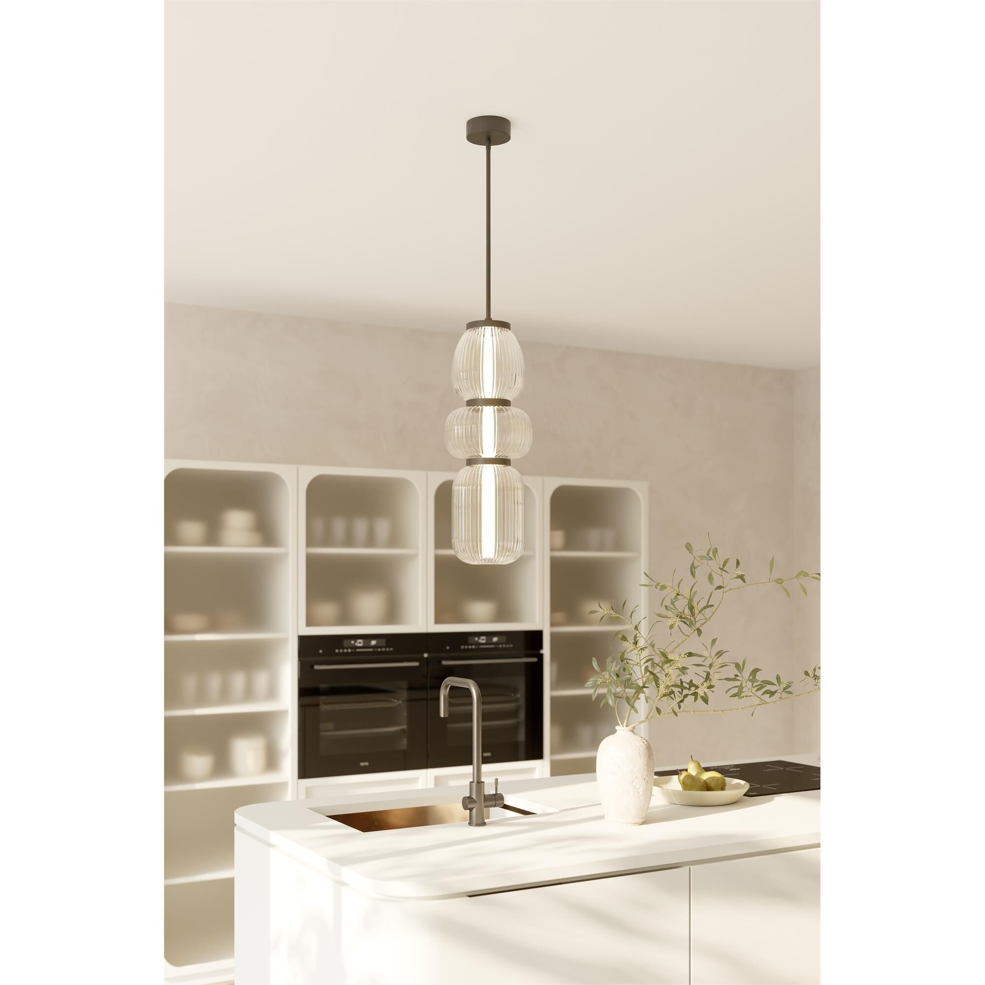 Shown in Legacy Brass finish and Clear Ribbed glass